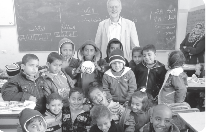 Jeremy Corbyn with Palestinian school children in a classroom in Gaza