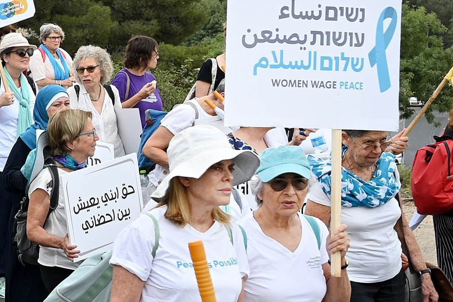 Ariella Giniger and Vivian Silver at a peace march on October 4 