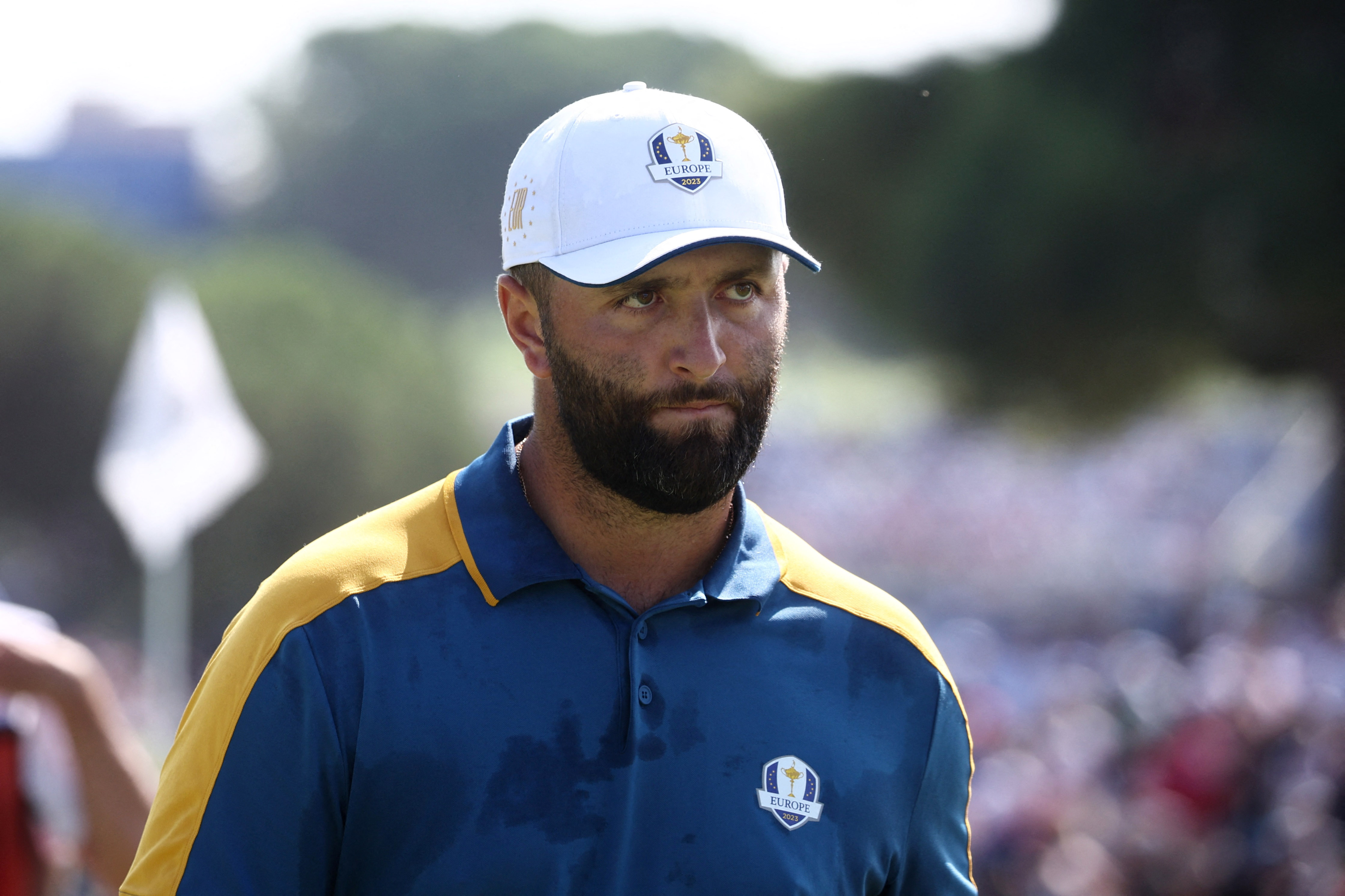 Jon Rahm walks off the 2nd green