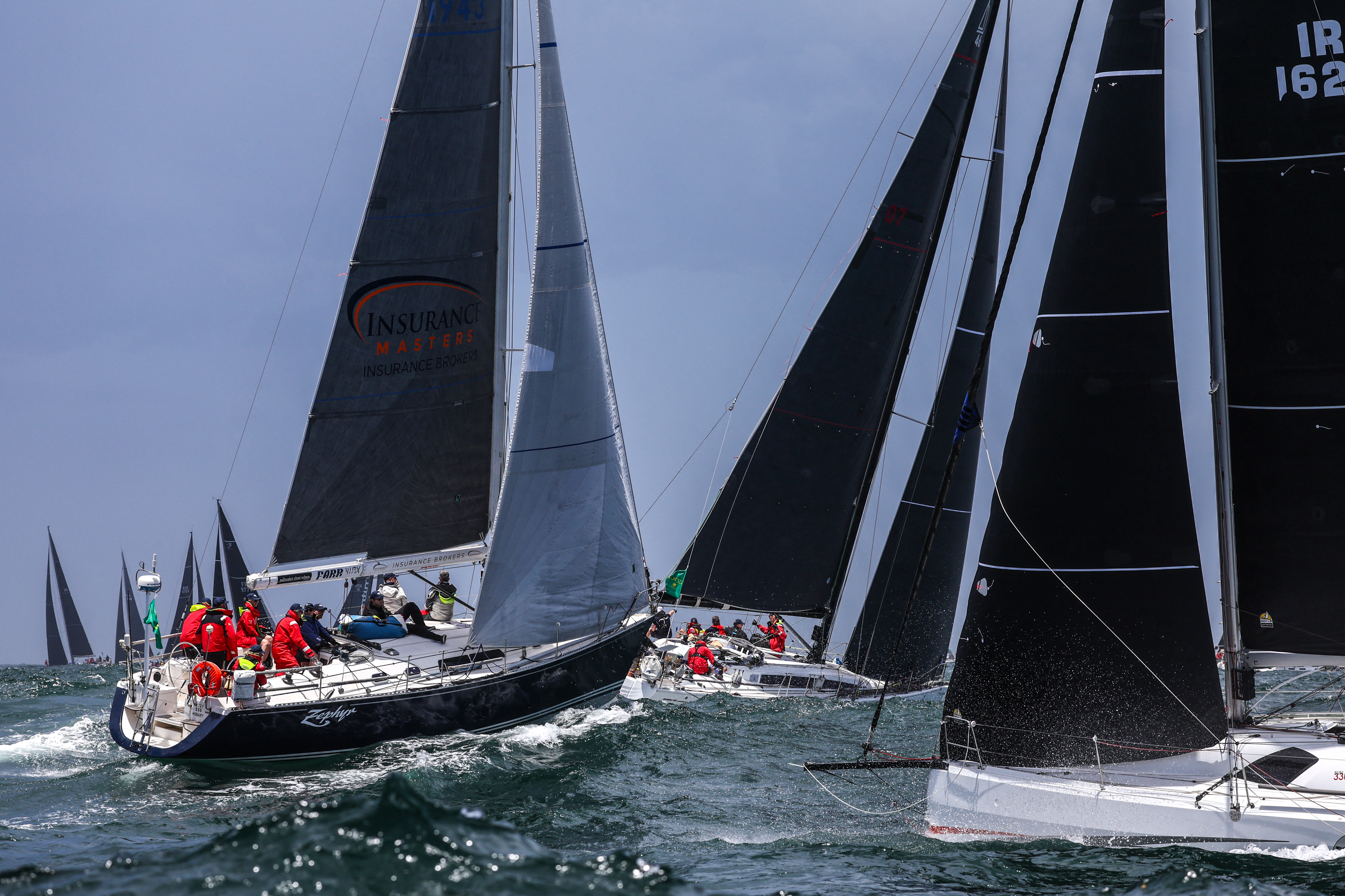 Yachts leaving Sydney Harbour in the annual Sydney to Hobart race