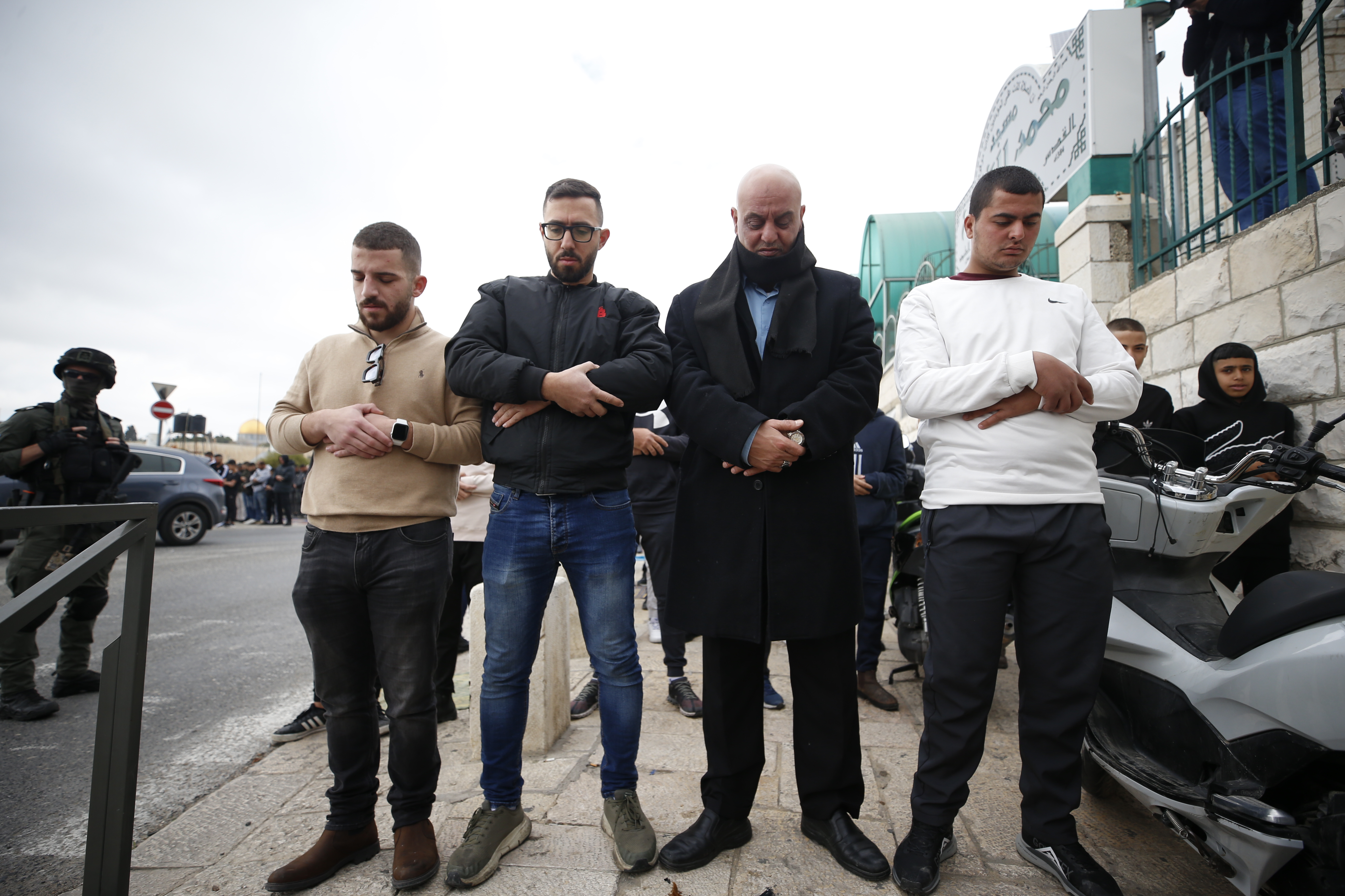 Israeli forces take security measures as the Palestinians perform their Friday prayers at the Wadi al-Jawiz and Ra's al-Amud neighborhoods as the Israeli forces continue to impose restrictions on Palestinians in East Jerusalem on December 29