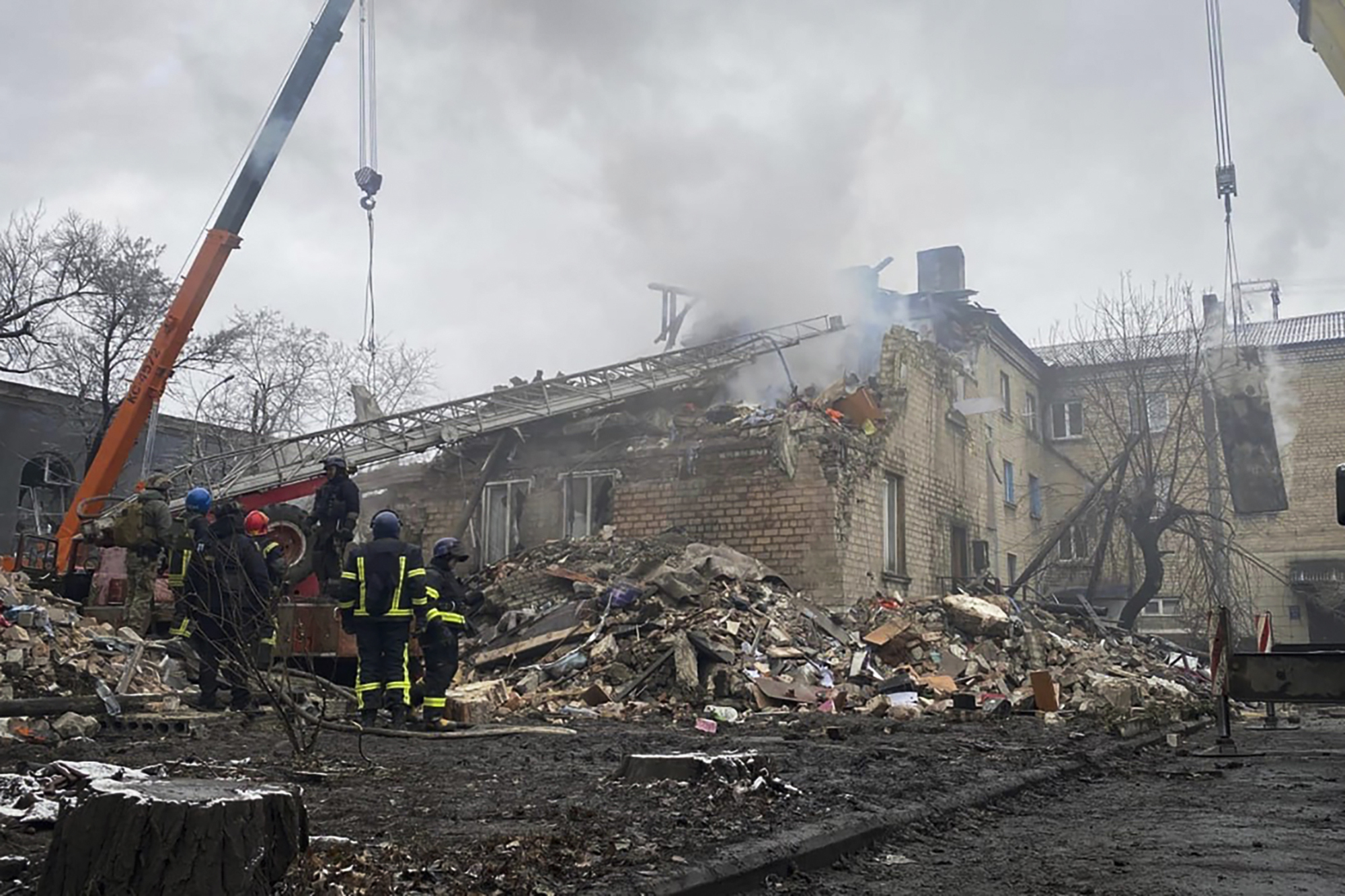 In this photo provided by the Ihor Moroz, Head of the Donetsk Regional Military Administration, rescuers work at the scene of a building damaged by shelling, in Novogrodivka, Ukraine, Thursday, November 30, 2023 [Ihor Moroz, Head of the Donetsk Regional Military Administration via AP]