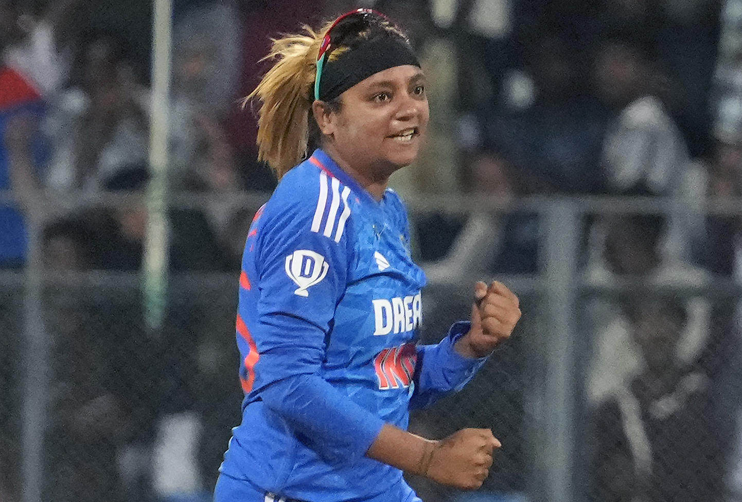 India's Saika Ishaque celebrates the wicket of England's Danielle Gibson during the third and final T20 women's cricket match between England and India in Mumbai, India, Sunday, Dec. 10, 2023. (AP Photo /Rajanish Kakade)