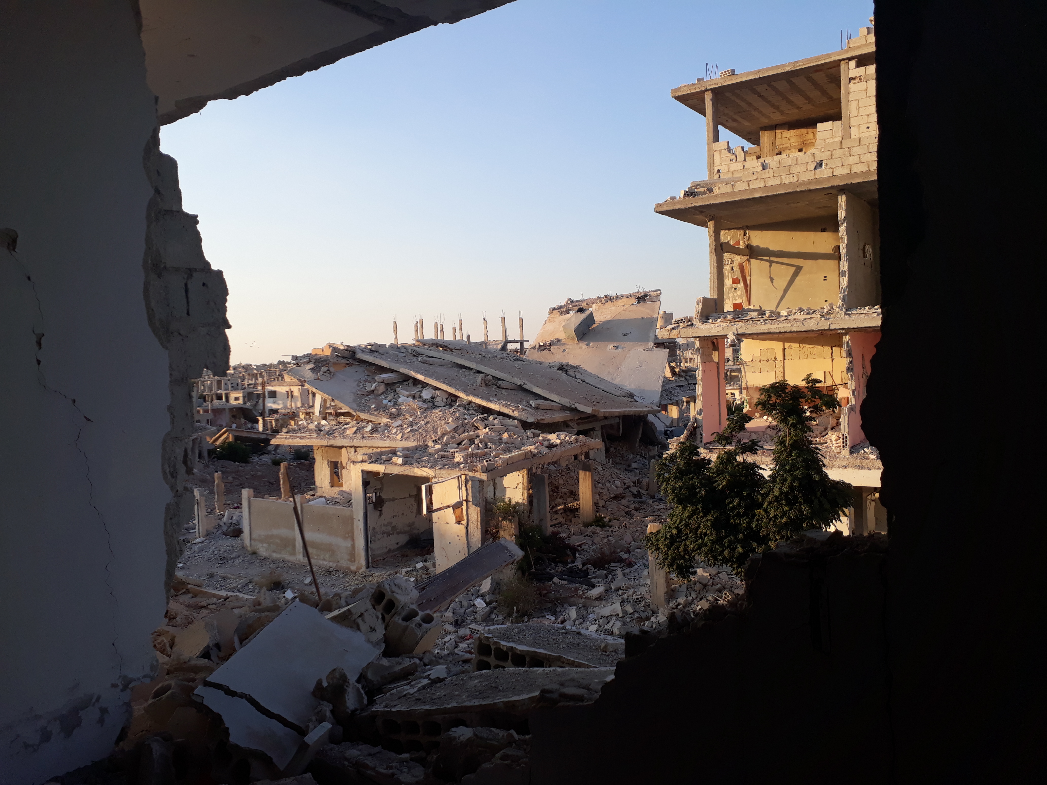 Destruction in the Tarik Al Sad neighbourhood, where Rania comes from, as a result of Assad forces bombing. Photo: Okba Mohammad