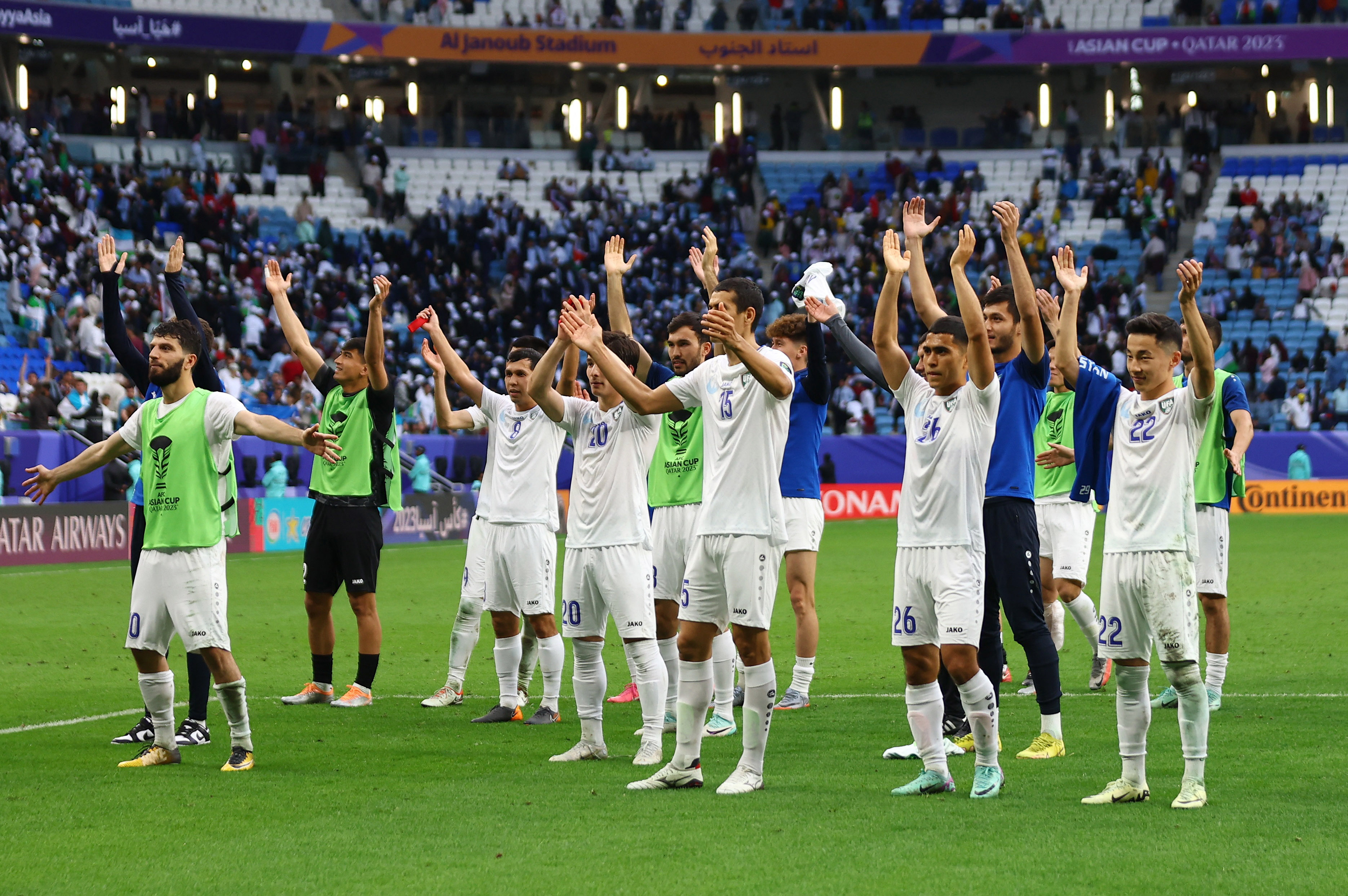 Soccer Football - AFC Asian Cup - Round of 16 - Uzbekistan v Thailand - Al Janoub Stadium, Al Wakrah, Qatar - January 30, 2024 Uzbekistan players celebrate after the match REUTERS/Rula Rouhana