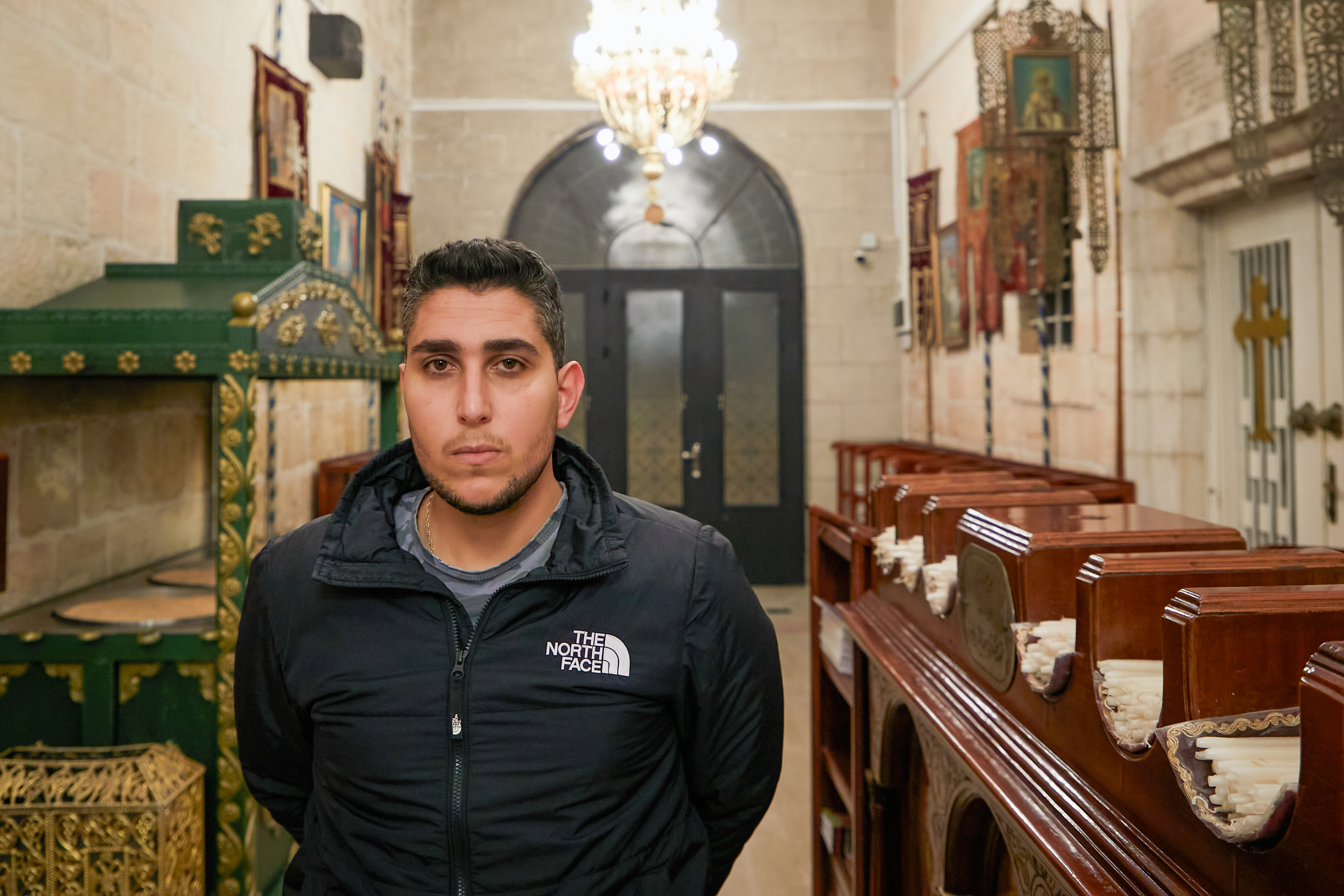 Abu Ghazaleh standing in church