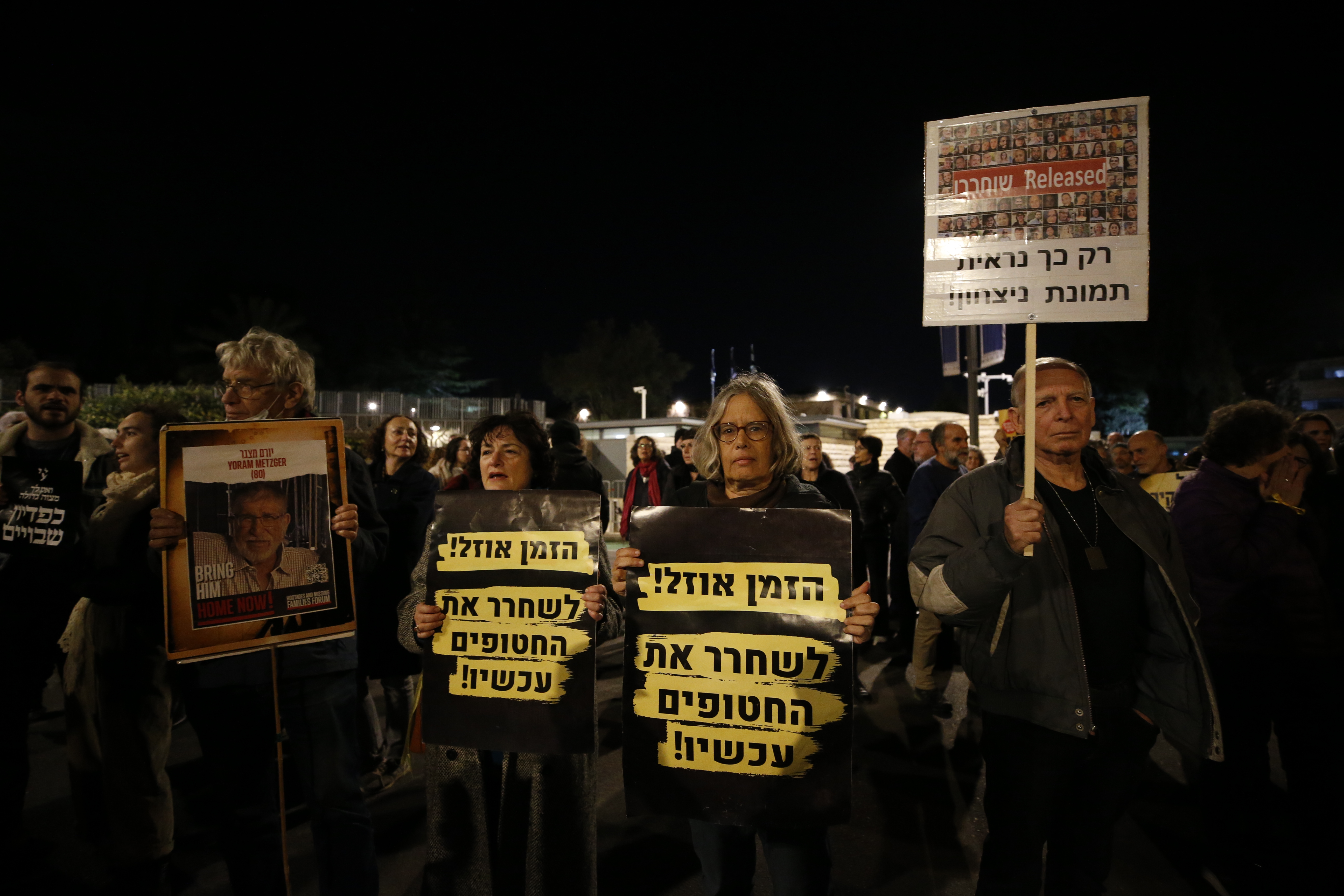 People gather in front of the house of Israeli President Isaac Herzog to demonstrate demanding the release of prisoners held by Hamas in Jerusalem on January 06