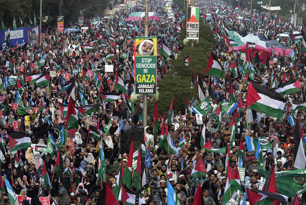 Supporters of Jamaat-e-Islami chant slogans during a protest against Israeli airstrikes and to show solidarity with Palestinian people living in Gaza, in Karachi, Pakistan, Sunday, Jan. 14, 2024. (AP Photo/Fareed Khan)
