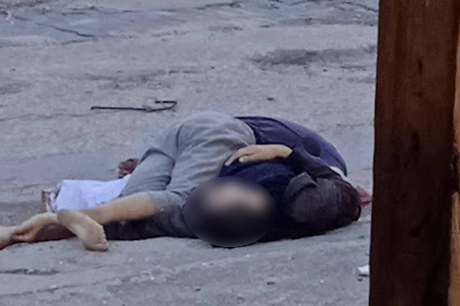 Nahedh and Ramez where they fell on the street after being shot