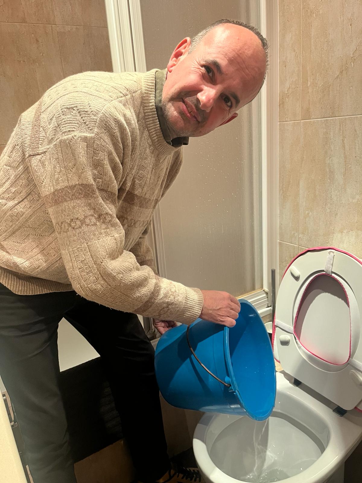 Miquel Marti uses water from his shower to flush his toilet as Barcelona suffers a severe drought [Courtesy: Miquel Marti]