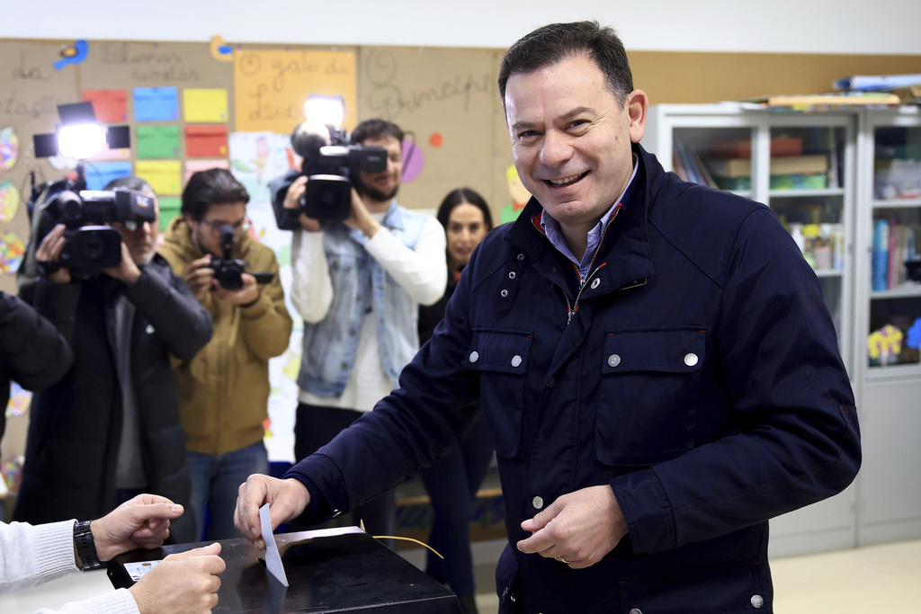 Luis Montenegro, the leader of the centre-right Democratic Alliance coalition, casts his ballot at a polling station in Espinho, northern Portugal, Sunday, March 10, 2024