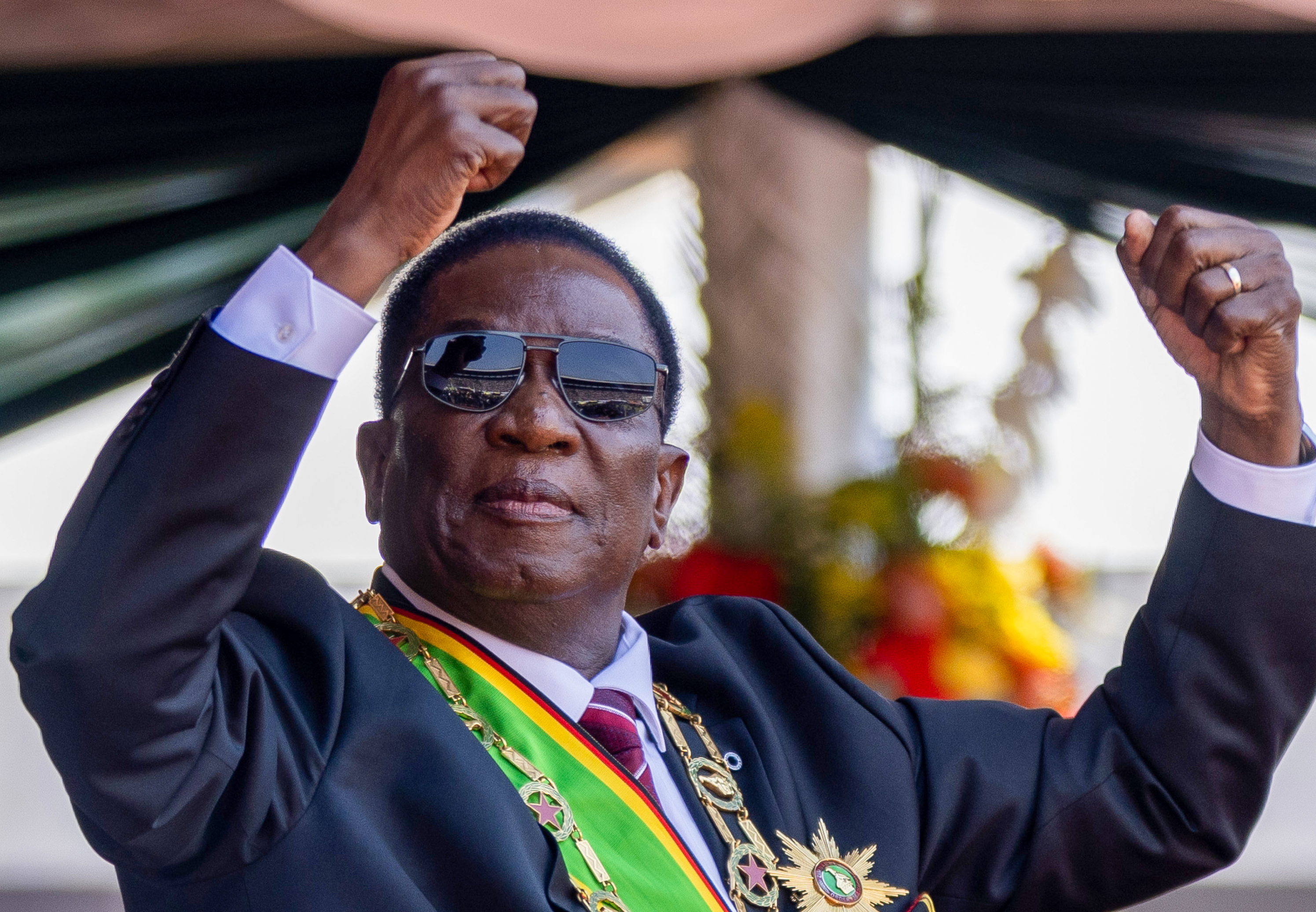 HARARE, ZIMBABWE - SEPTEMBER 4: Zimbabwe's president Emmerson Mnangagwa dances as he celebrates after being inaugurated at a local stadium on September 4, 2023 in Harare, Zimbabwe. Mnangagwa won a new term in the country's general elections held in late August. (Photo by Tafadzwa Ufumeli/Getty Images)