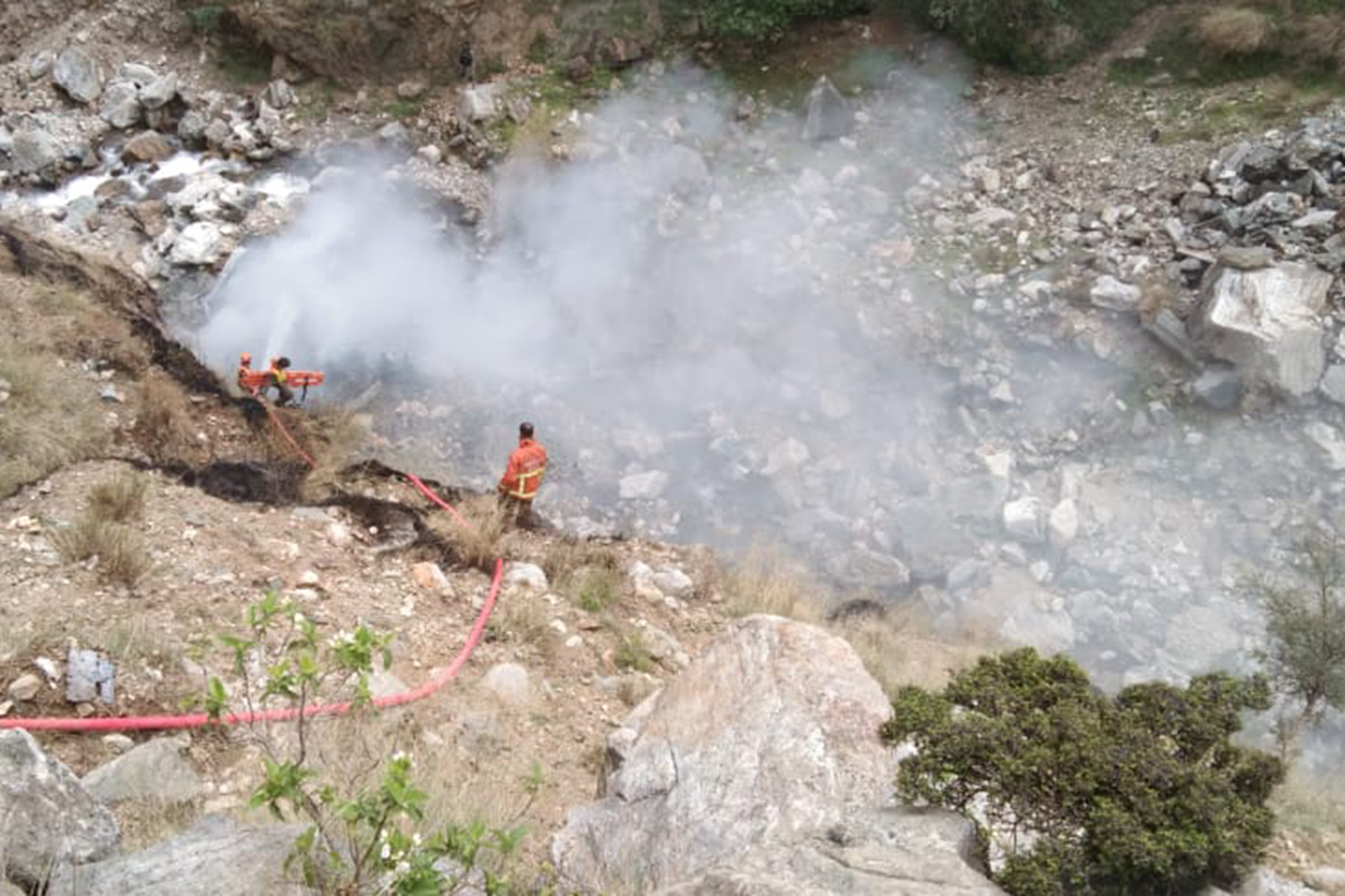 The vehicle fell in this gorge after the suicide blast [Courtesy: Rescue 1122]