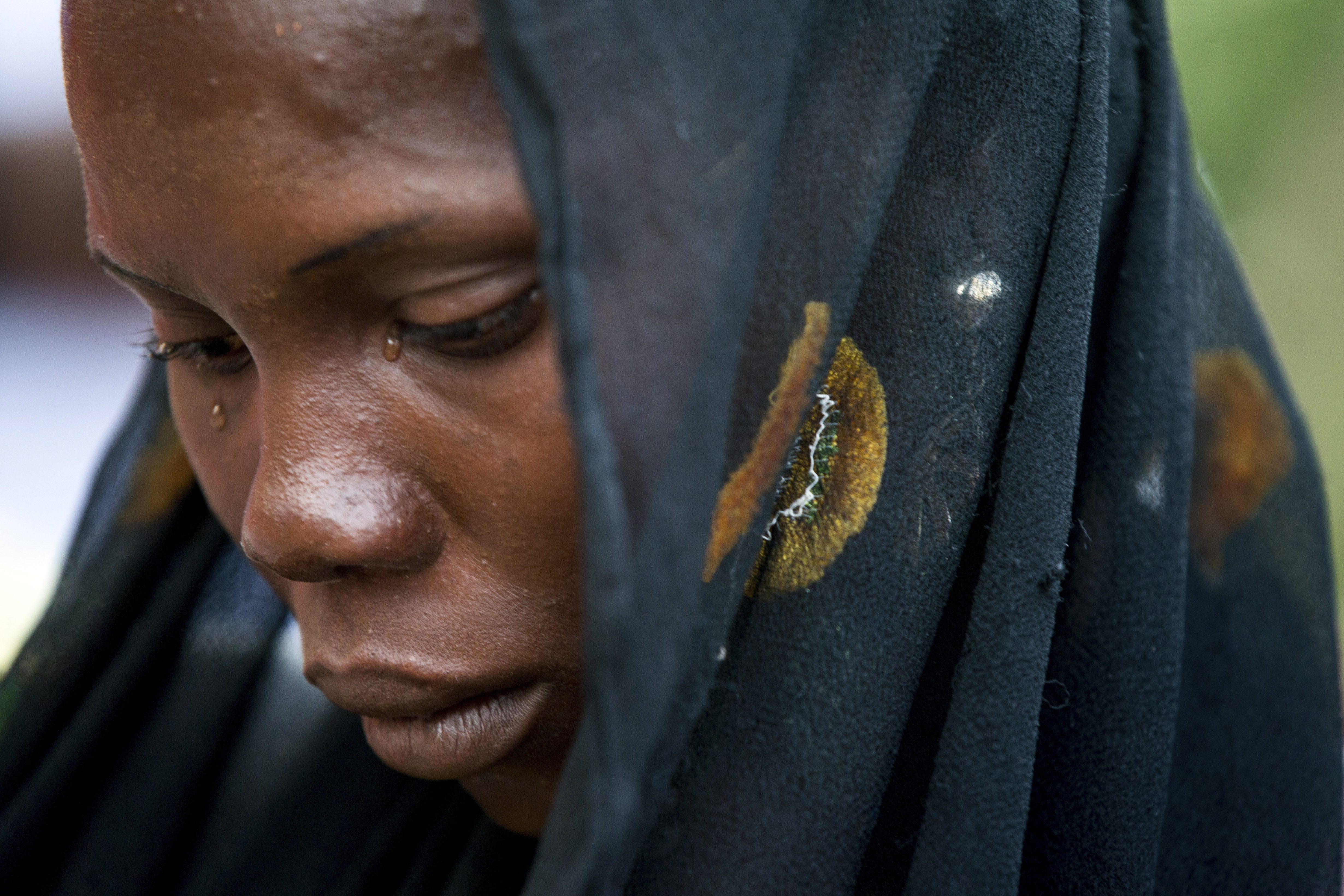 A freed Chibok girl cries telling her story