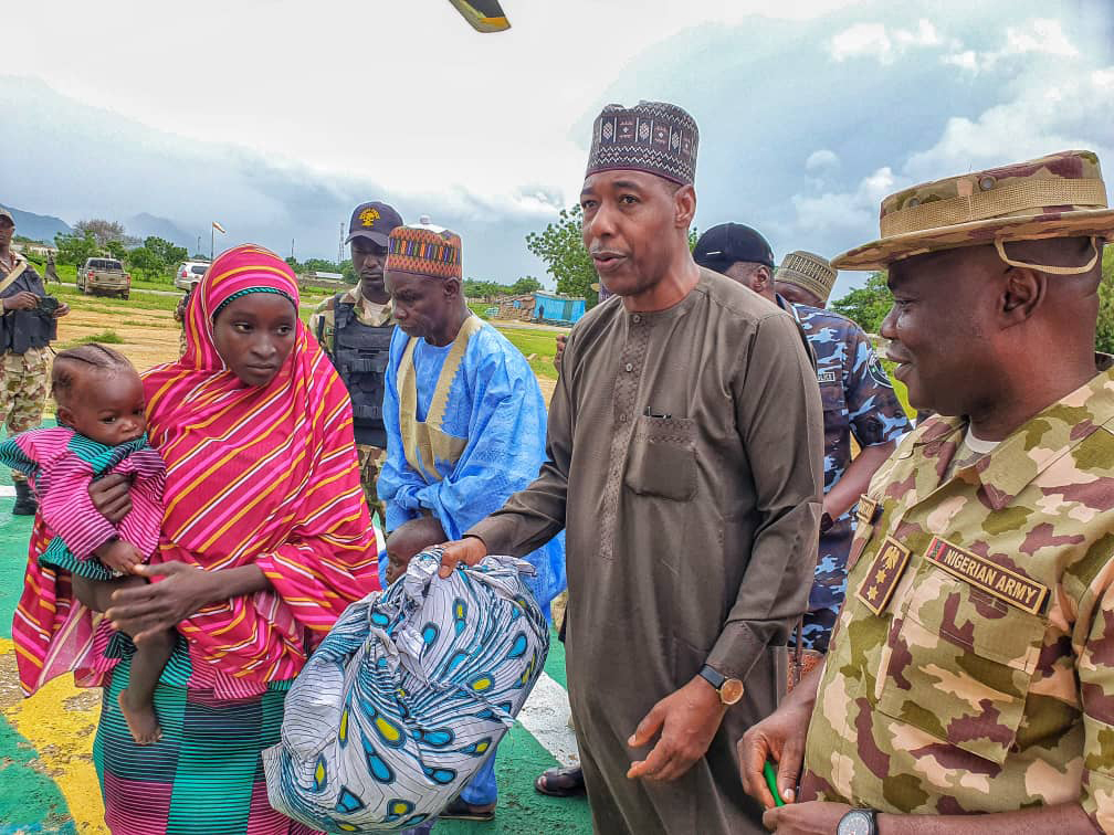 Recently freed Chibok girl stands with Borno governor Babagana Zulum