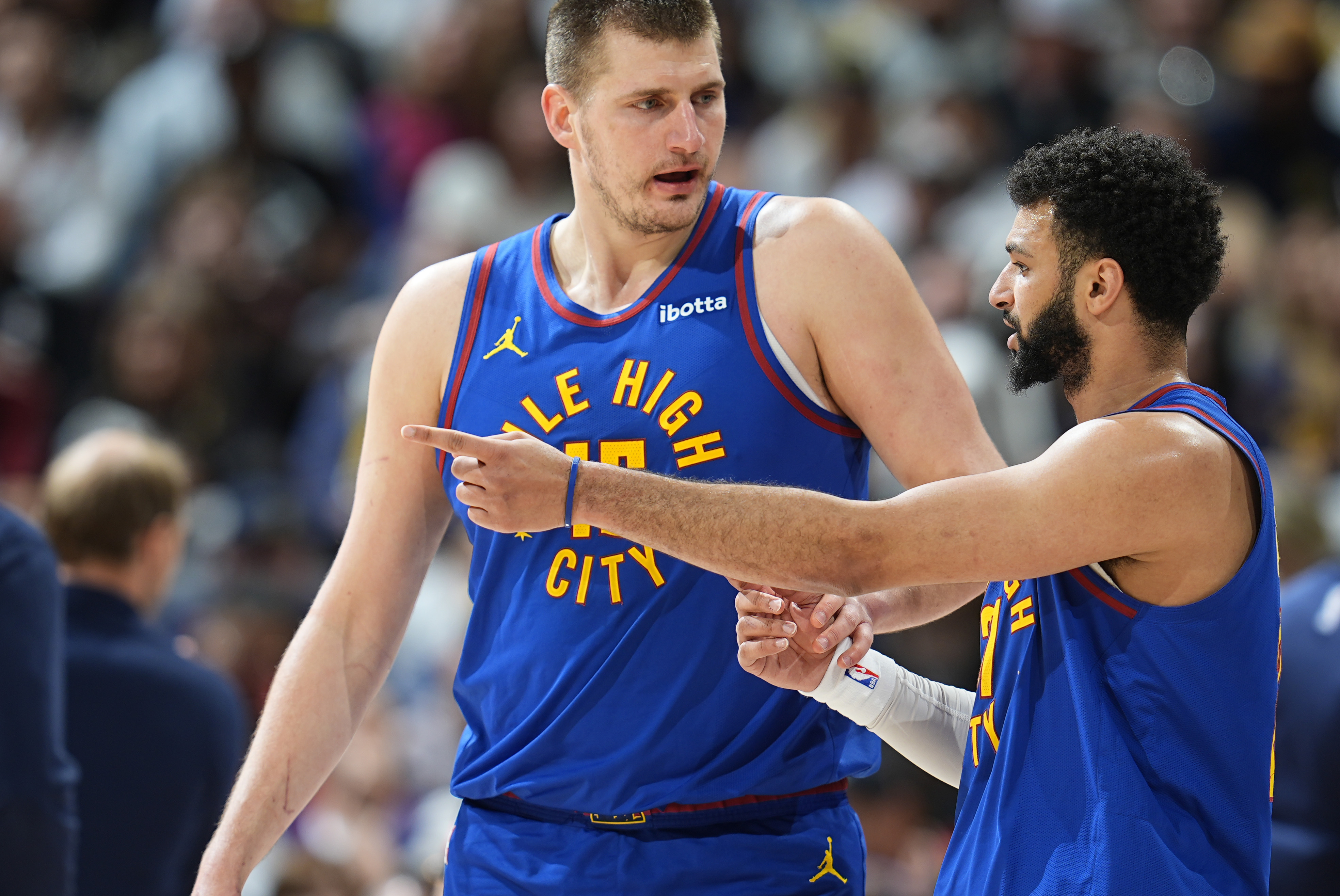 Denver Nuggets guard Jamal Murray, right and teammate Nikola Jokic.