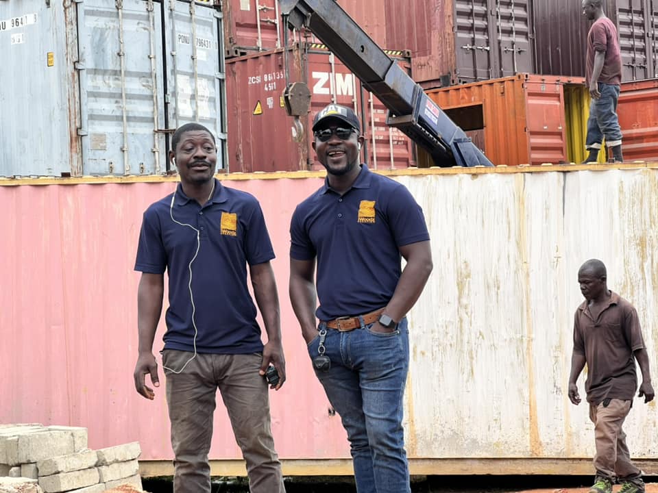 Eric Kwaku Gyimah with a member of staff at one of his construction sites near Accra, Ghana [Courtesy of Eric Kwaku Gyimah]