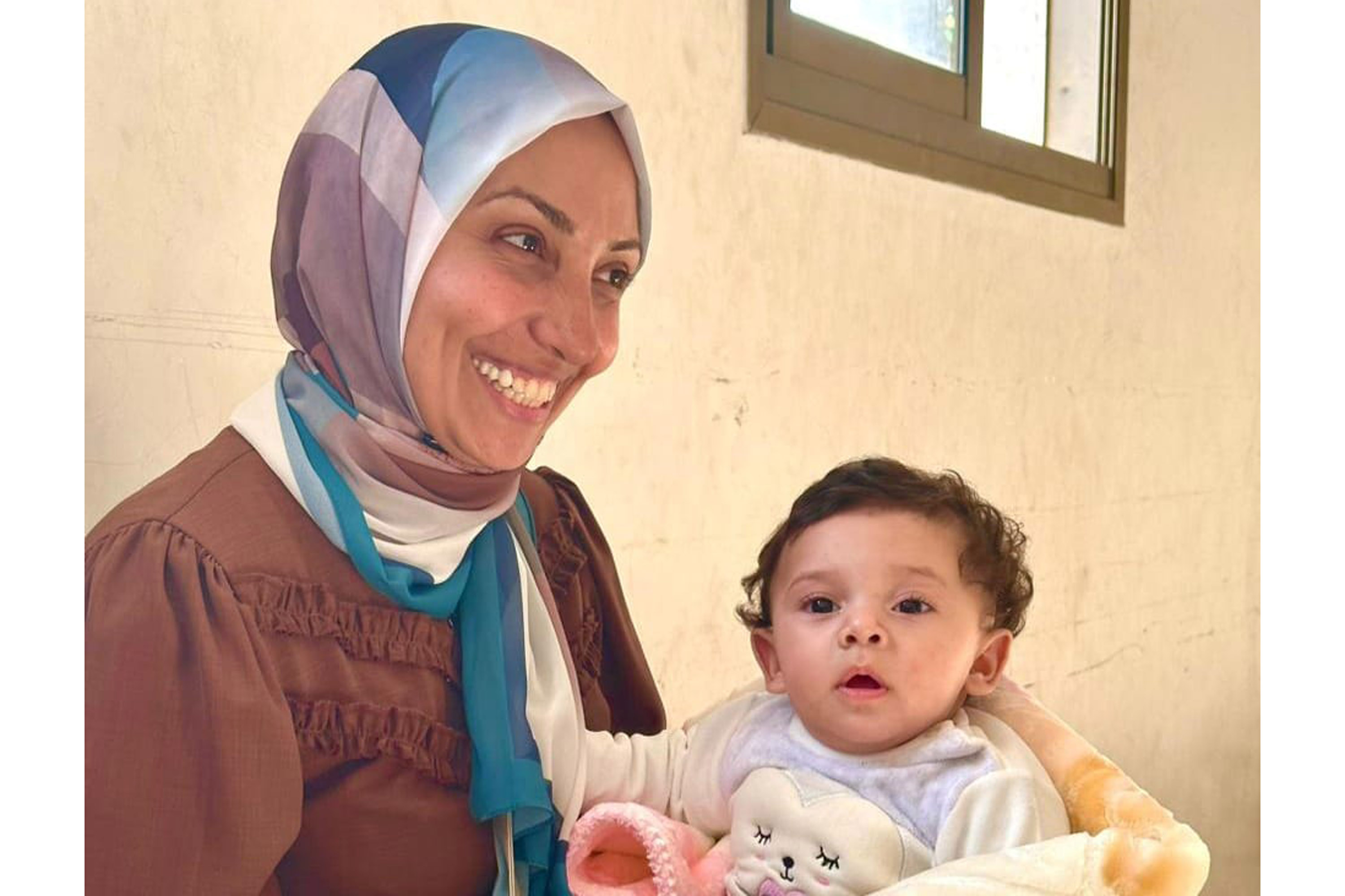 Amna Homaid and her baby daughter Duha