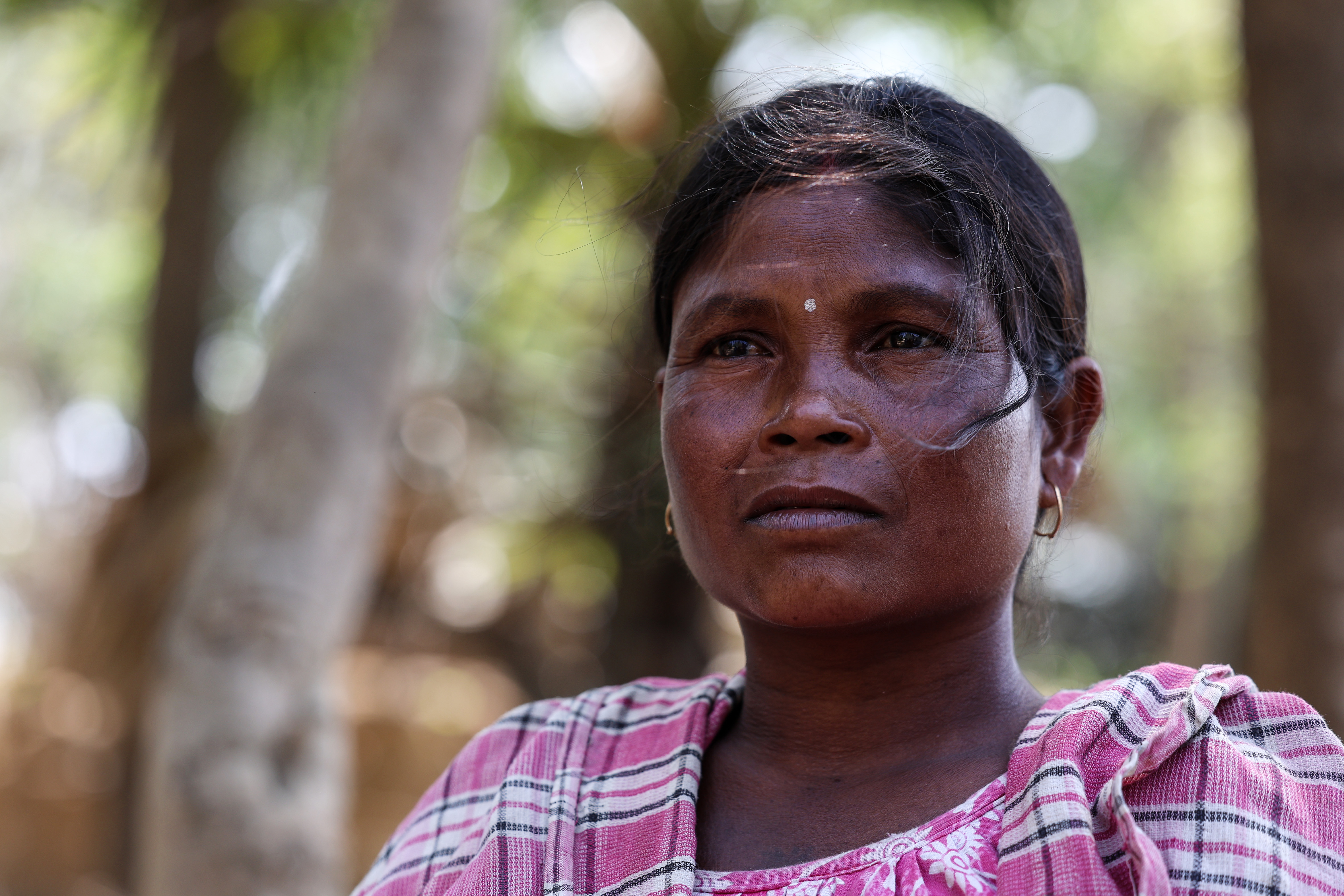 Maku Hazda, 32, an Adivasi woman who fought against the Deucha Pachami coal mine project, during an interview in Sagar Bandi, West Bengal