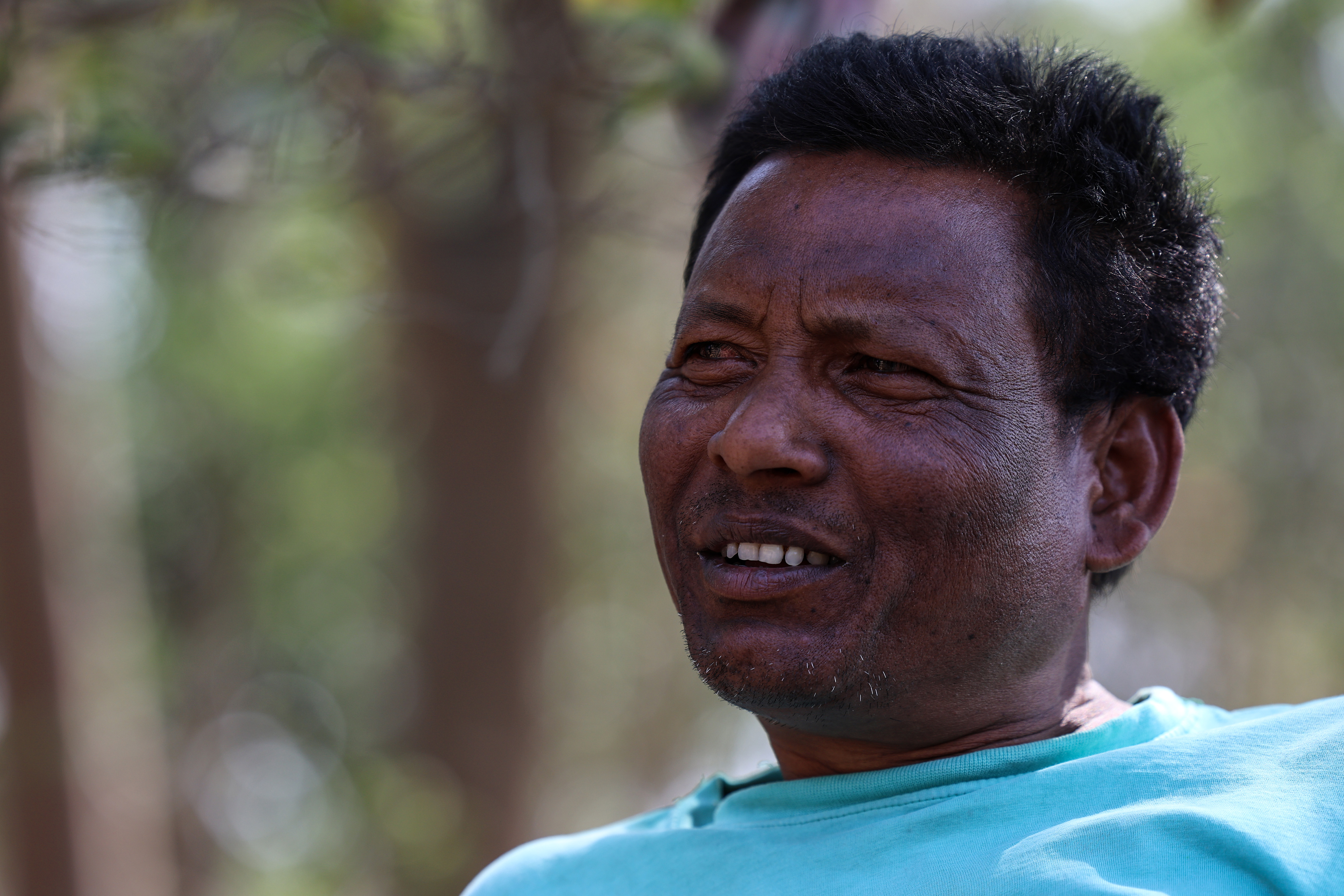 Kkokan Mardi, 53, an Adivasi man who fought against the Deucha Pachami coal mine project, in Sagar Bandi, West Bengal