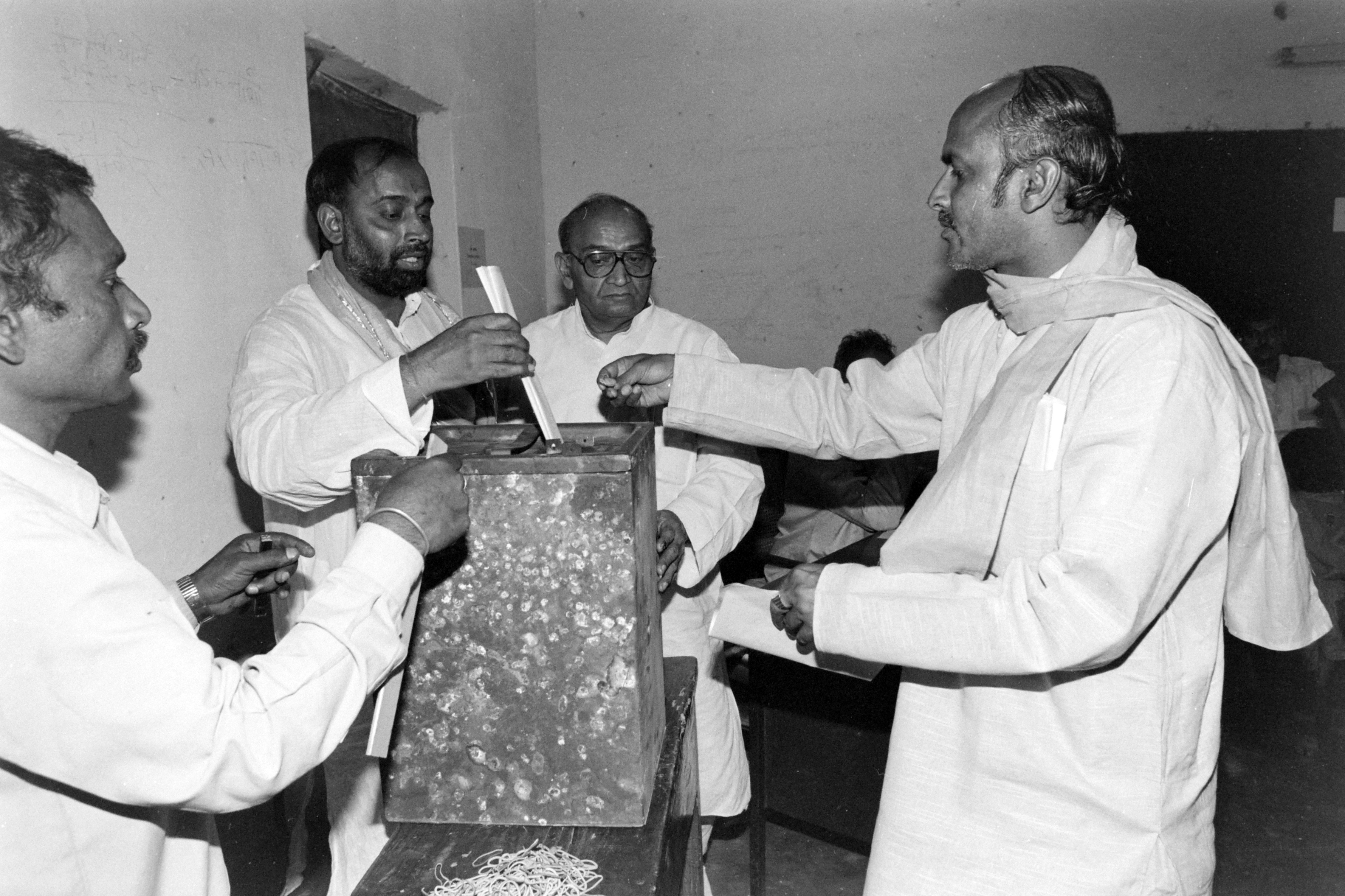 Bharatiya Janata Party (BJP) leader Vijay Goel casts his vote in a ballot box for Parliamentary elections in New Delhi, India, April 29, 1996.