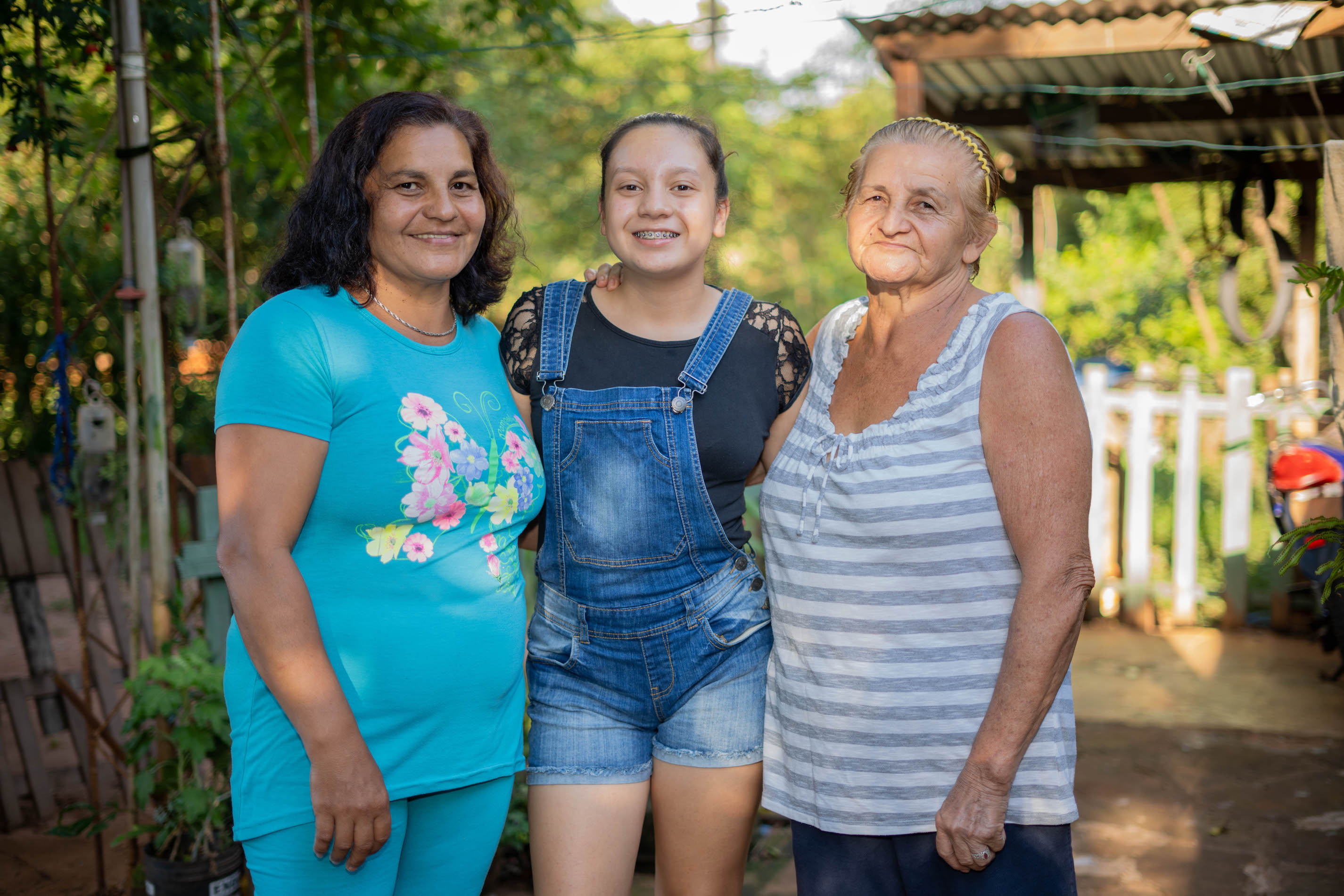 Maria, 73 (right), with her daughter, Ester, 51 (left), and granddaughter, Alma, 16 (centre) in Paraguay [Courtesy: Plan International]