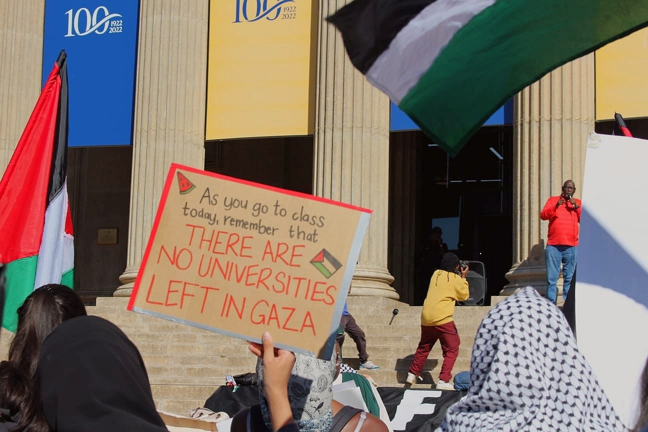 Protesters at Wits University hold placards in support of Gaza [Courtesy of Zahra Carrim]