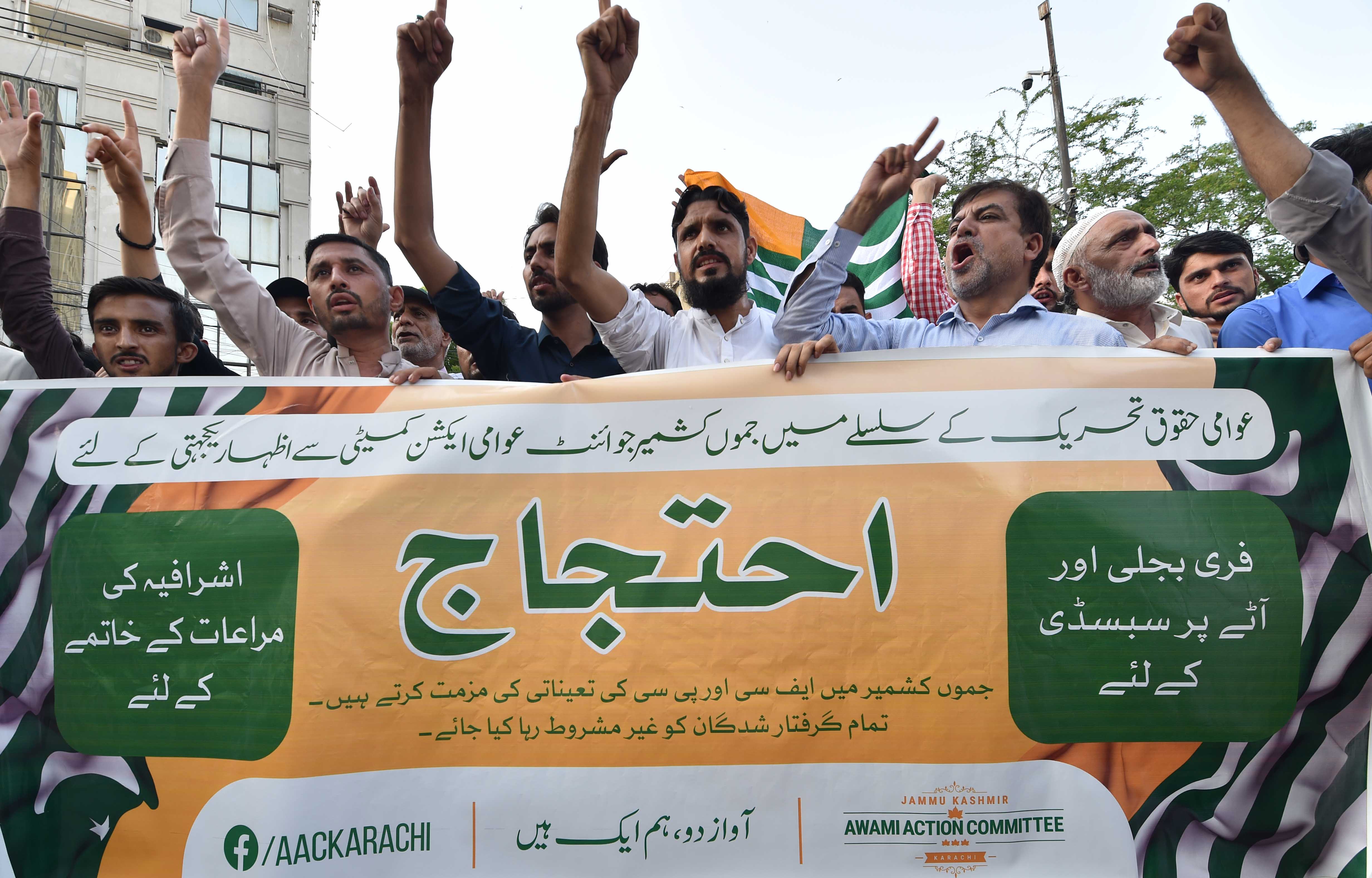 Kashmiris in Pakistan's southern city of Karachi also took out rally to support the protests in Pakistan-administered Kashmir. [Shahzaib Akber/EPA]