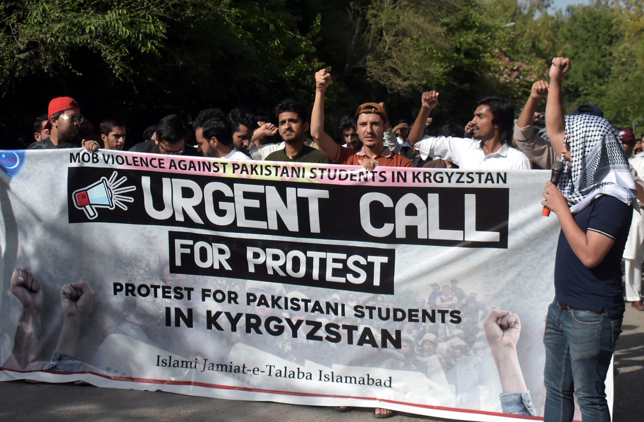 Pakistanis protest against the attacks on international students, including Pakistanis, in Kyrgyz capital of Bishkek last week. [Sohail Shahzad/EPA]