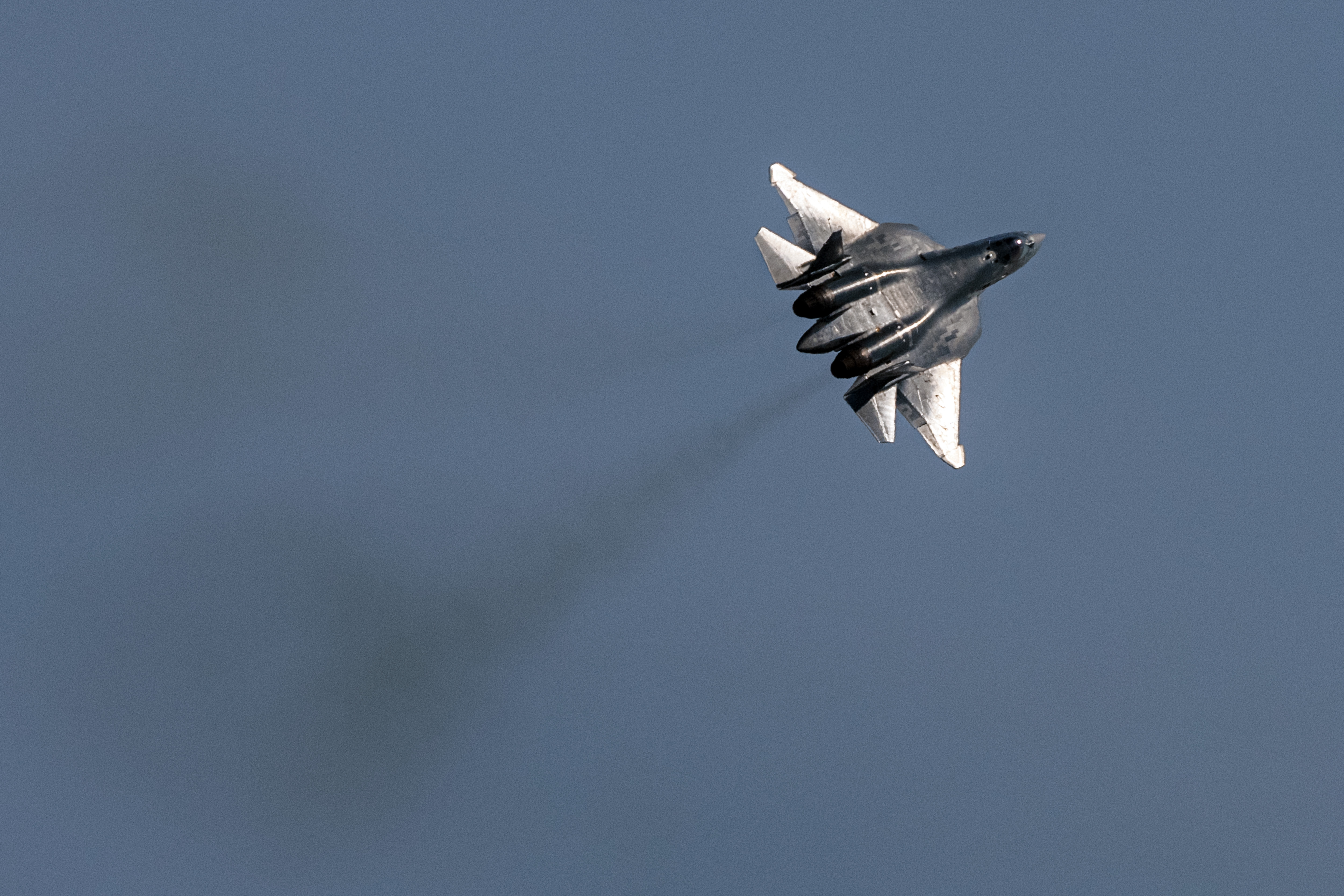 A Russian Sukhoi Su-57 fifth-generation jet fighter performs during an air show at the MAKS 2021 International Aviation and Space Salon