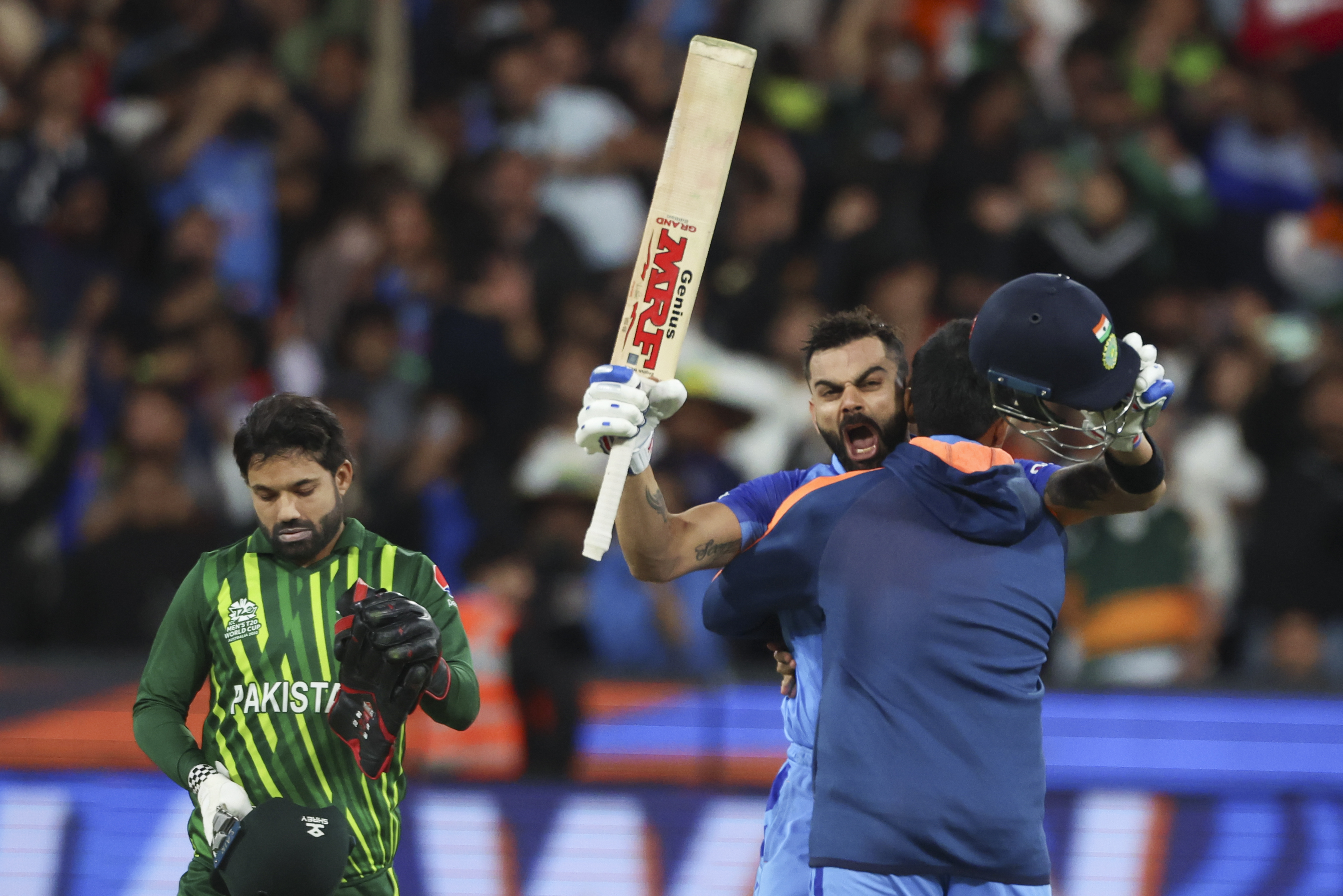 India's Virat Kohli reacts after winning the T20 World Cup cricket match against Pakistan in Melbourne, Australia, Sunday, Oct. 23, 2022. (AP Photo/Asanka Brendon Ratnayake)