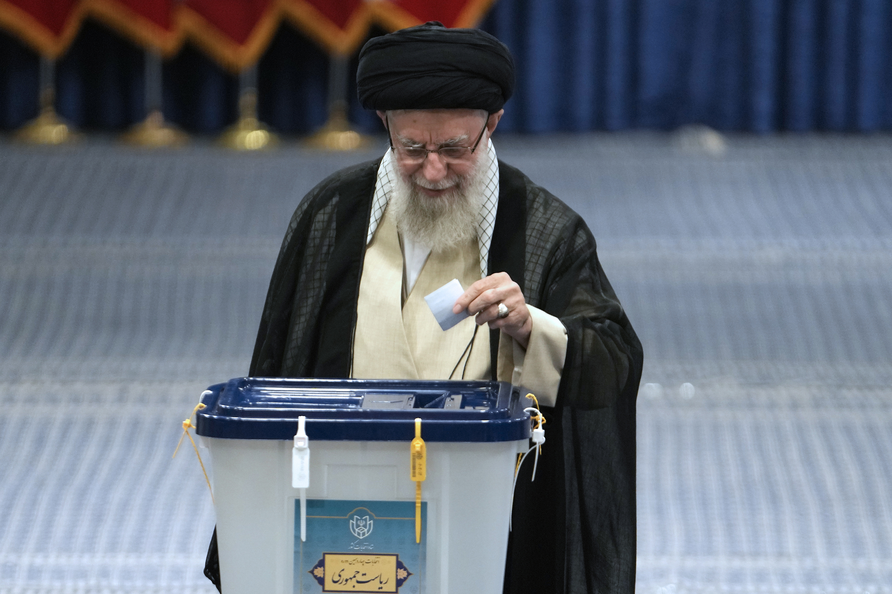 Supreme Leader Ayatollah Ali Khamenei casts his ballot in Tehran