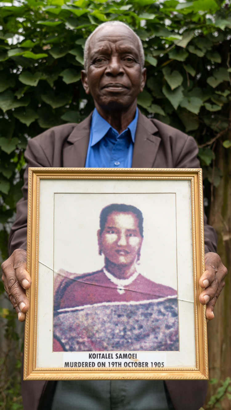 Cheruiyot Barsirian holds a computer-generated image of what Koitalel may have looked like