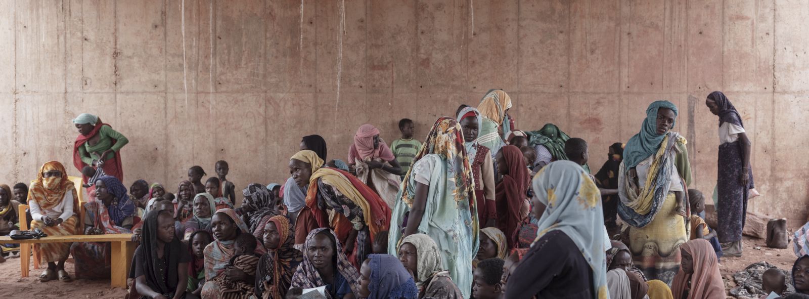 Sudanese refugee women wait to register in Adre, Chad with UNHCR after escaping fighting and famine in Darfur.