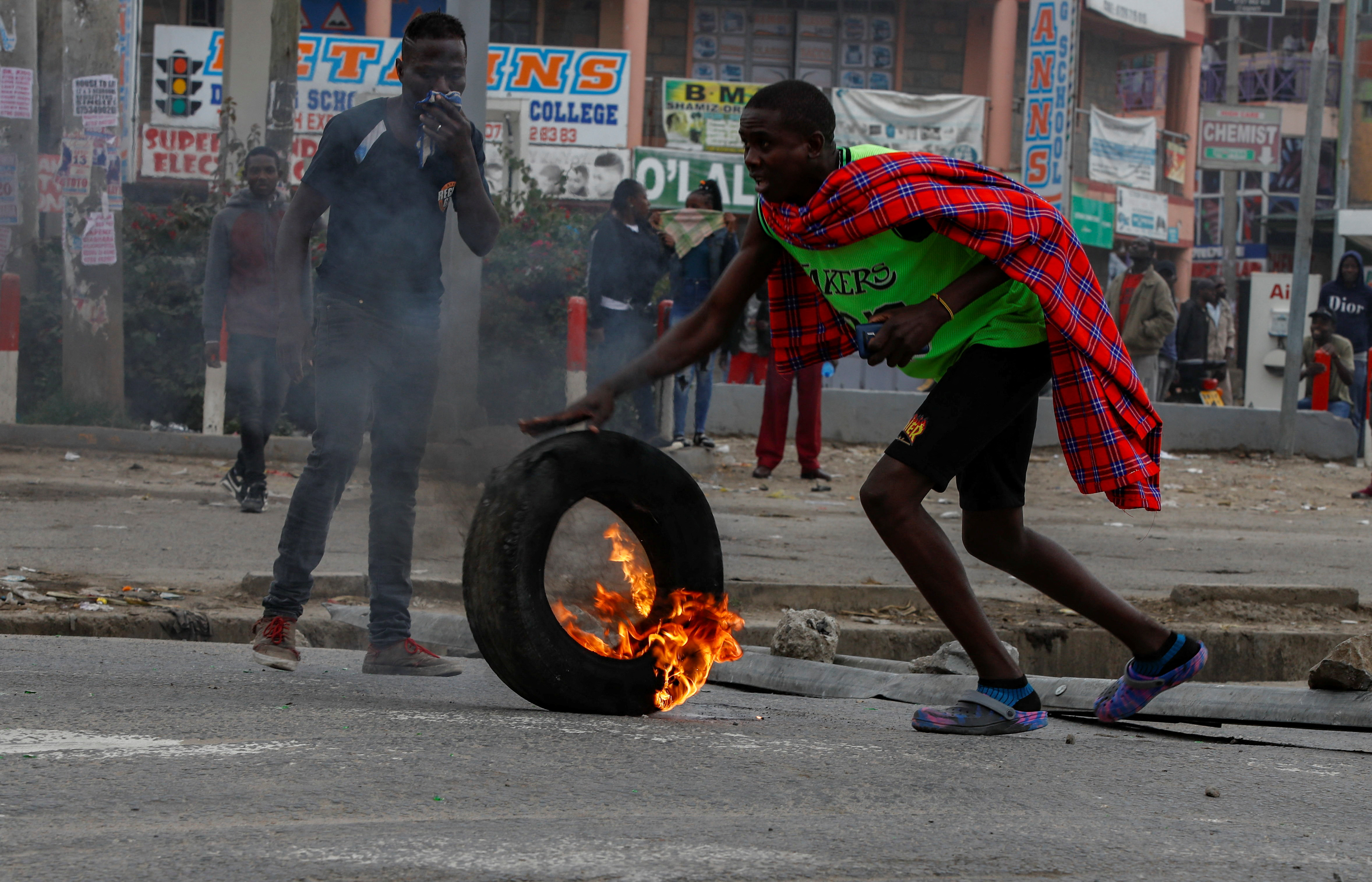 A protestor reacts during an anti-government demonstration