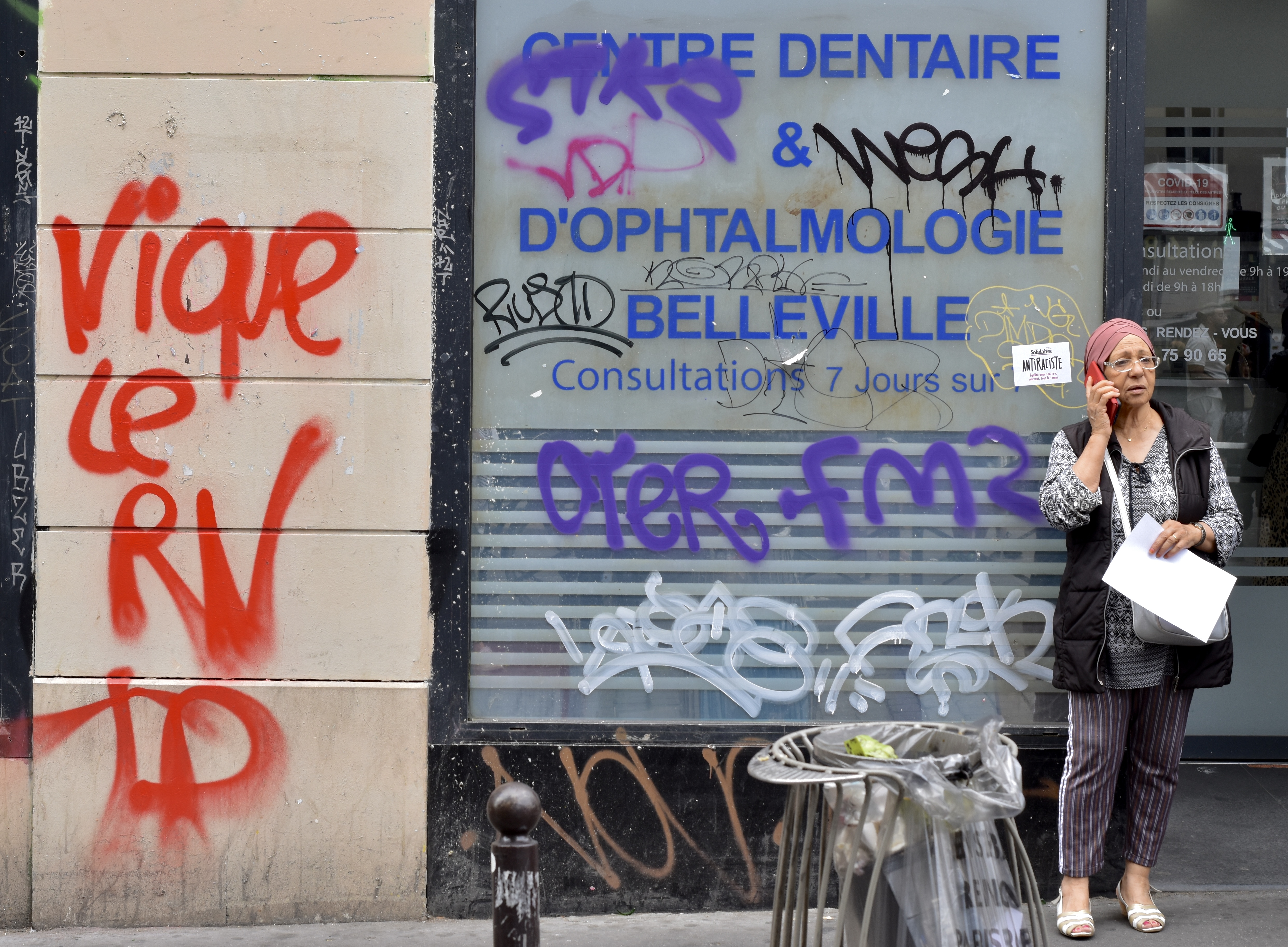Graffiti reading ‘F*** the National Rally’ is sprayed on a wall in Paris