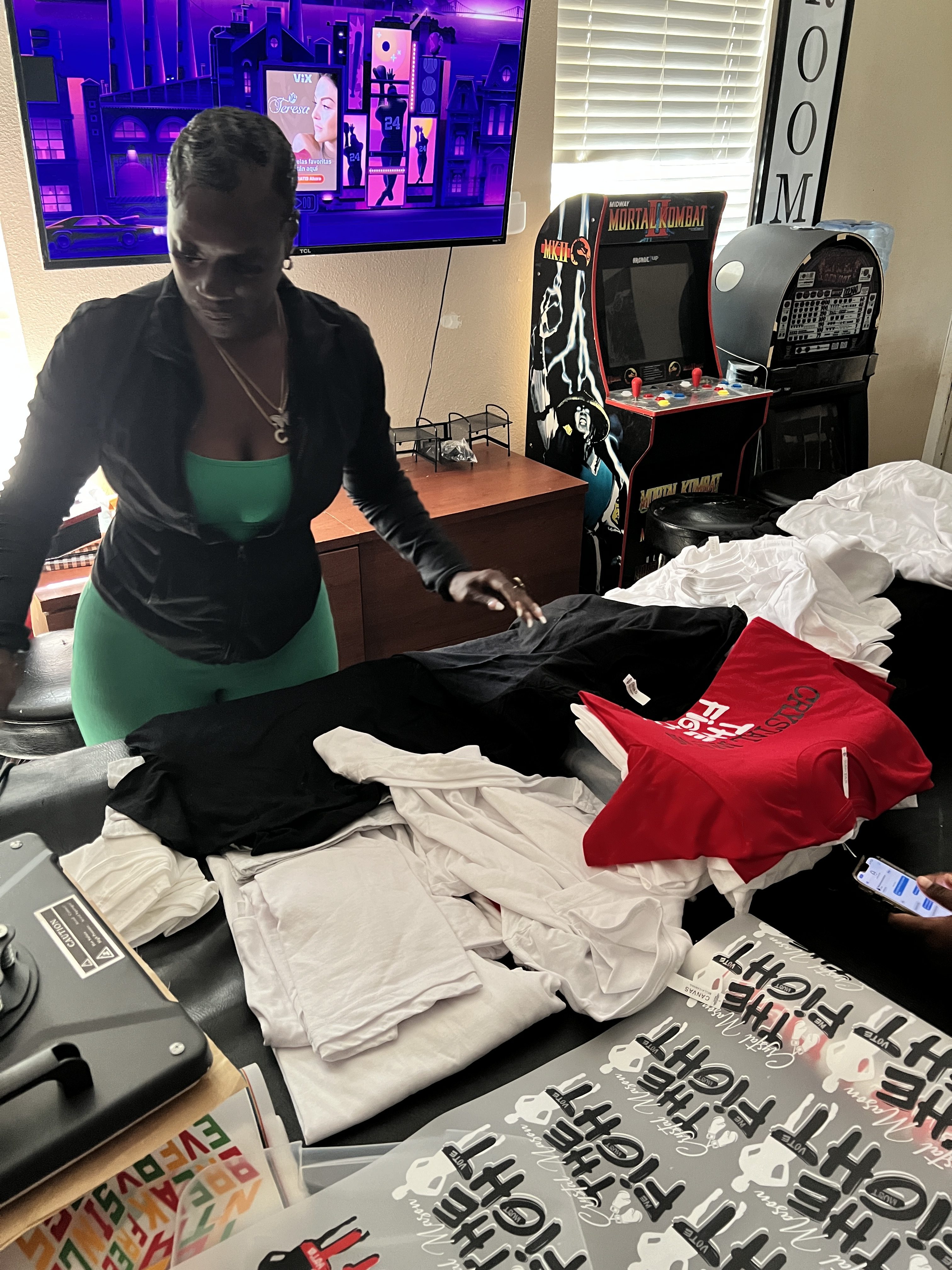 Crystal Mason prints T-shirts in her home.