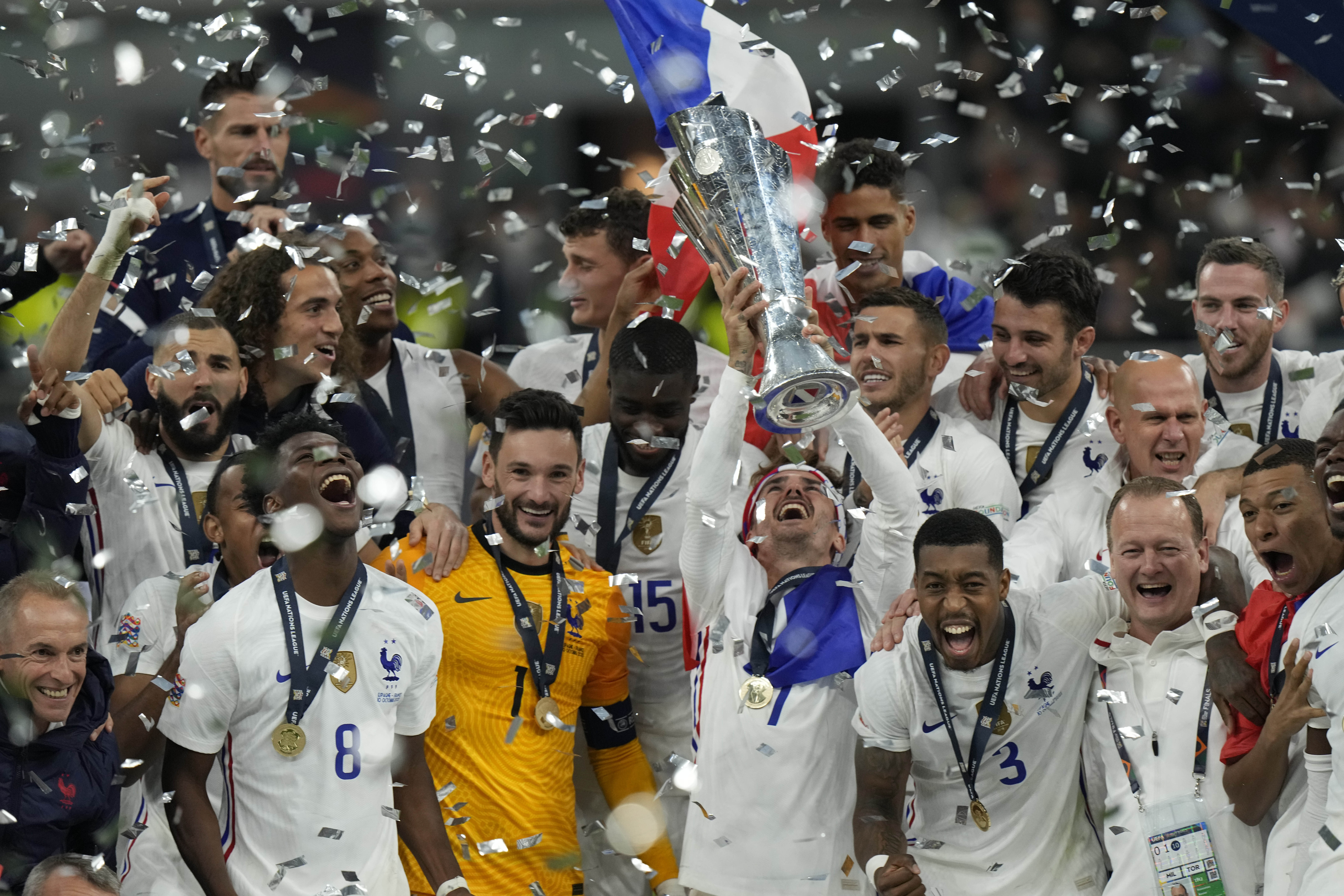 France's players celebrate their victory at the end of the UEFA Nations League final soccer match between France and Spain at the San Siro stadium, in Milan, Italy, Sunday, Oct. 10, 2021. (AP Photo/Luca Bruno)