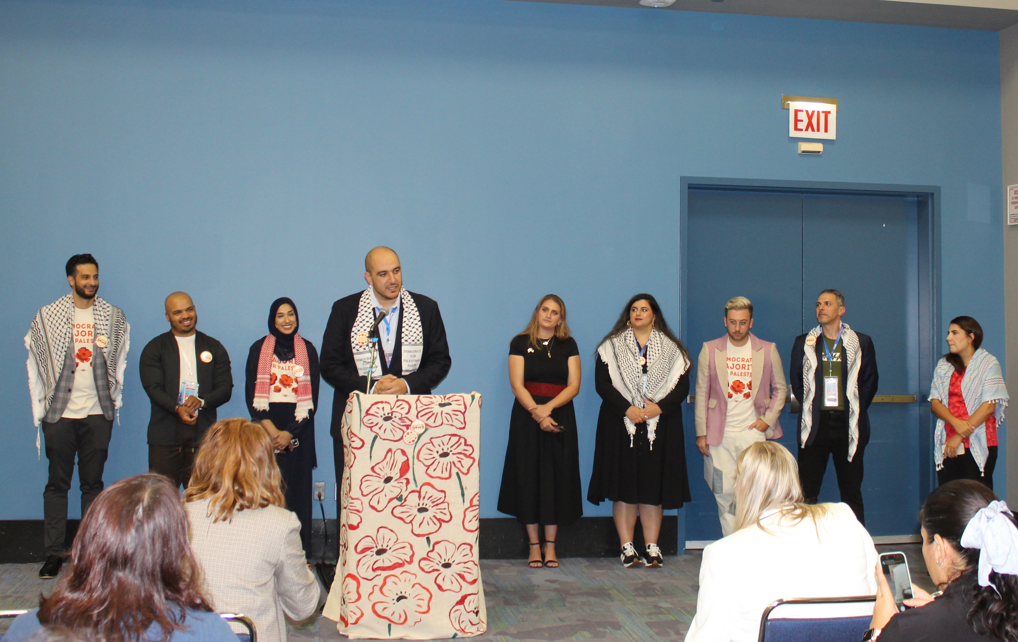 Uncommitted delegates speak to reporters on the sidelines of the Democratic National Convention in Chicago on August 19
