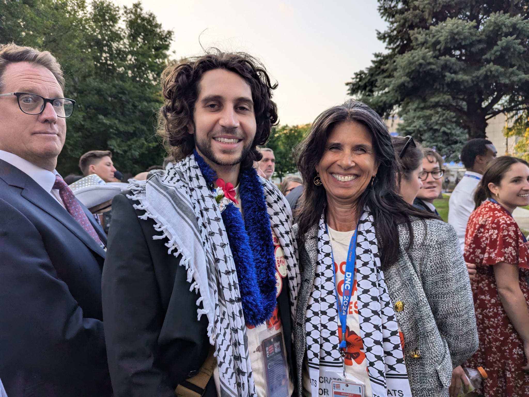 Shay Chan Hodges, right, poses for a photo with fellow uncommitted Hawaii delegate Jonathan Simonds outside the Democratic National Convention in Chicago on August 19