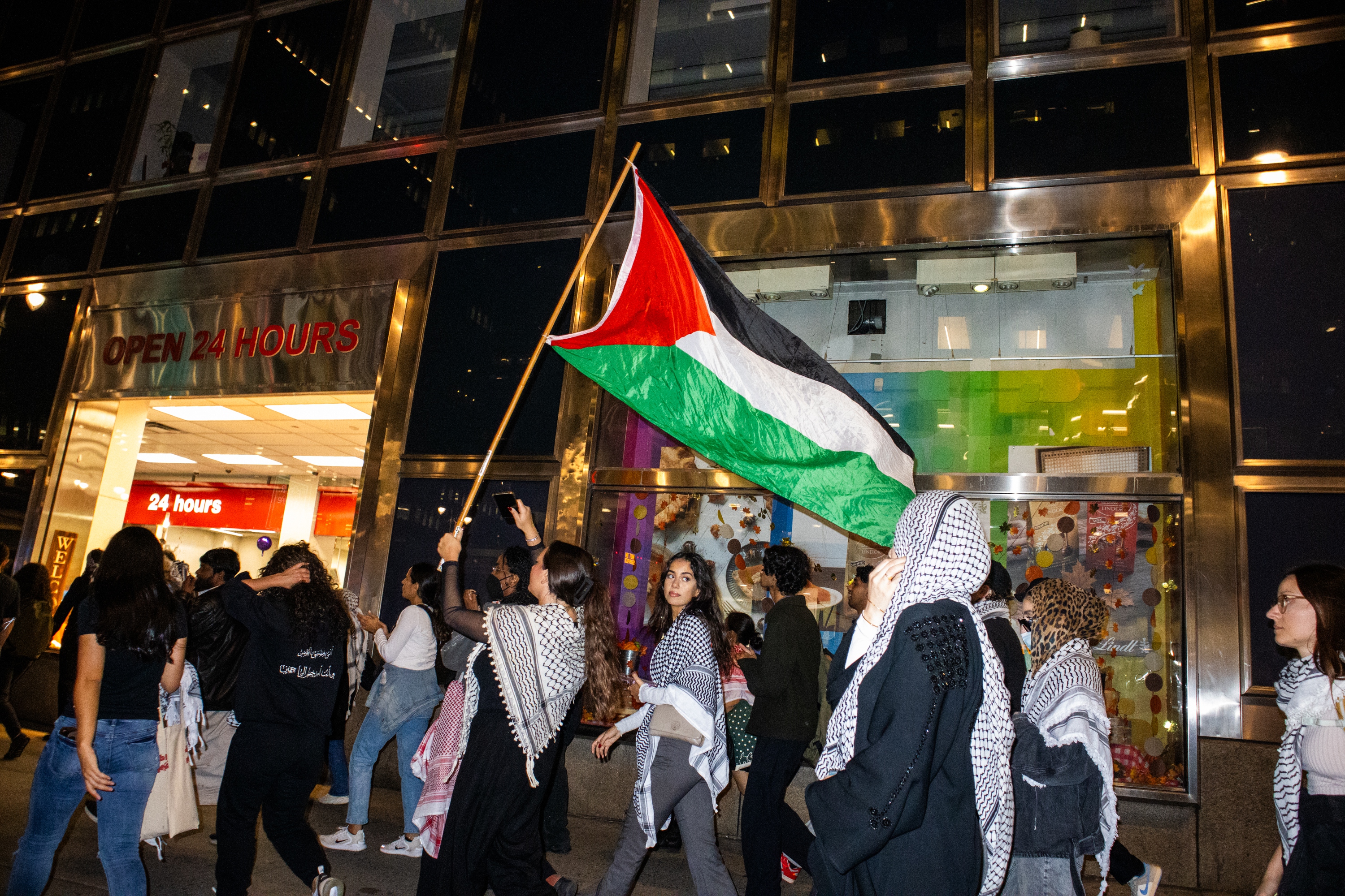 People protest in solidarity with the Palestinian and Lebanese people and to condemn the Israeli airstrikes in Lebanon and Gaza, in New York