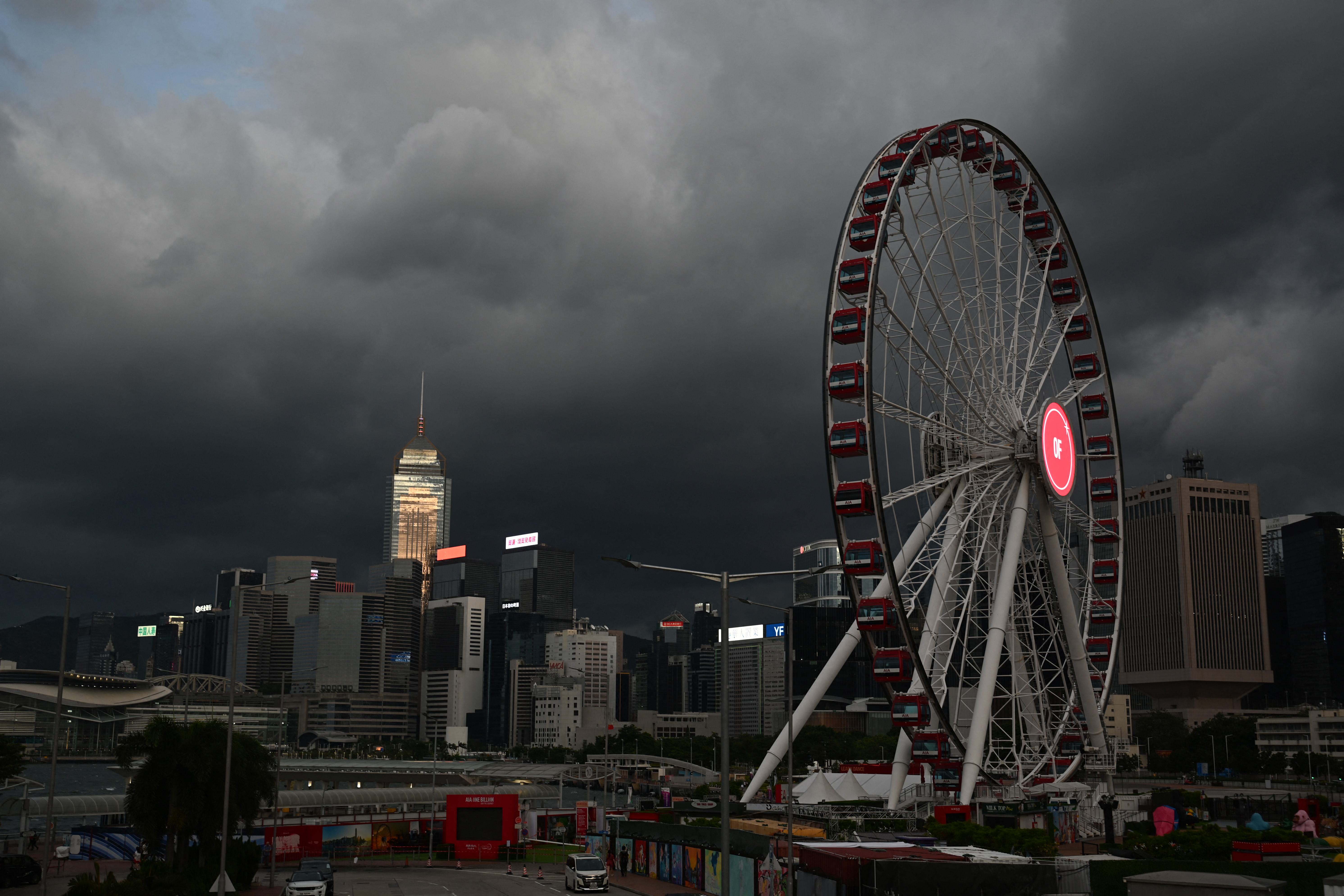 Storm clouds gather over buildings in Hong Kong