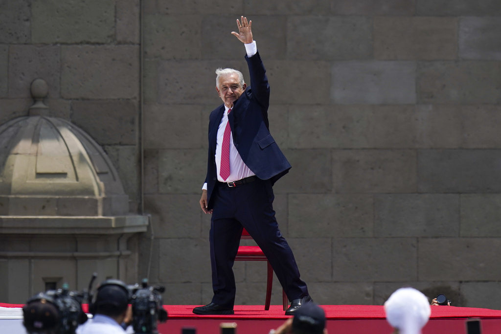 Lopez Obrador waves to supporters