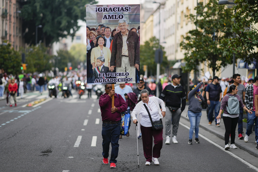 People gather to listen to Lopez Obrador deliver his last State of the Union at the Zocalo, Mexico City’s main square, on September 1