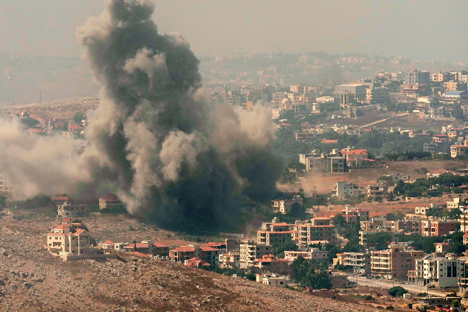 Smoke rises from Israeli airstrikes in the southern village of Kfar Rouman, south Lebanon