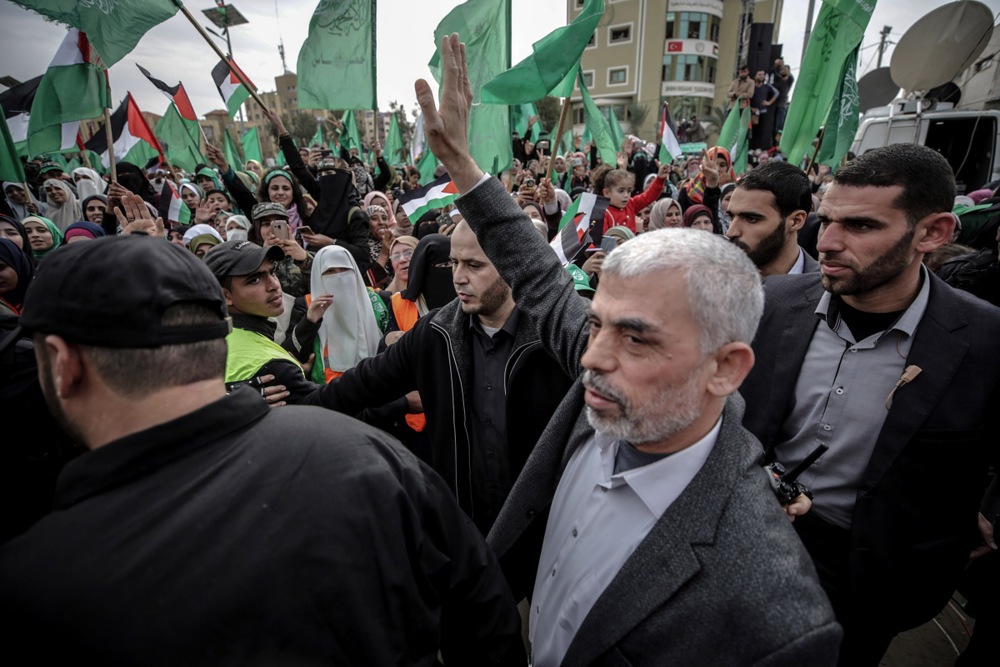 epa11664849 (FILE) - Hamas Gaza leader Yahya Al Sinwar (C) waves to supporters during a Hamas rally to mark the 31st anniversary of the group, in Gaza City, Gaza Strip, 16 December 2018 (reissued 17 October 2024). The Israeli Army, Tsahal, on 17 October 2024 confirmed that Hamas leader Yahya Sinwar was "eliminated" on 16 October 'after a year-long pursuit'. Sinwar was appointed Hamas leader in August 2024, a few days after his predecessor had been killed in Iran. EPA-EFE/MOHAMMED SABER *** Local Caption *** 56753906