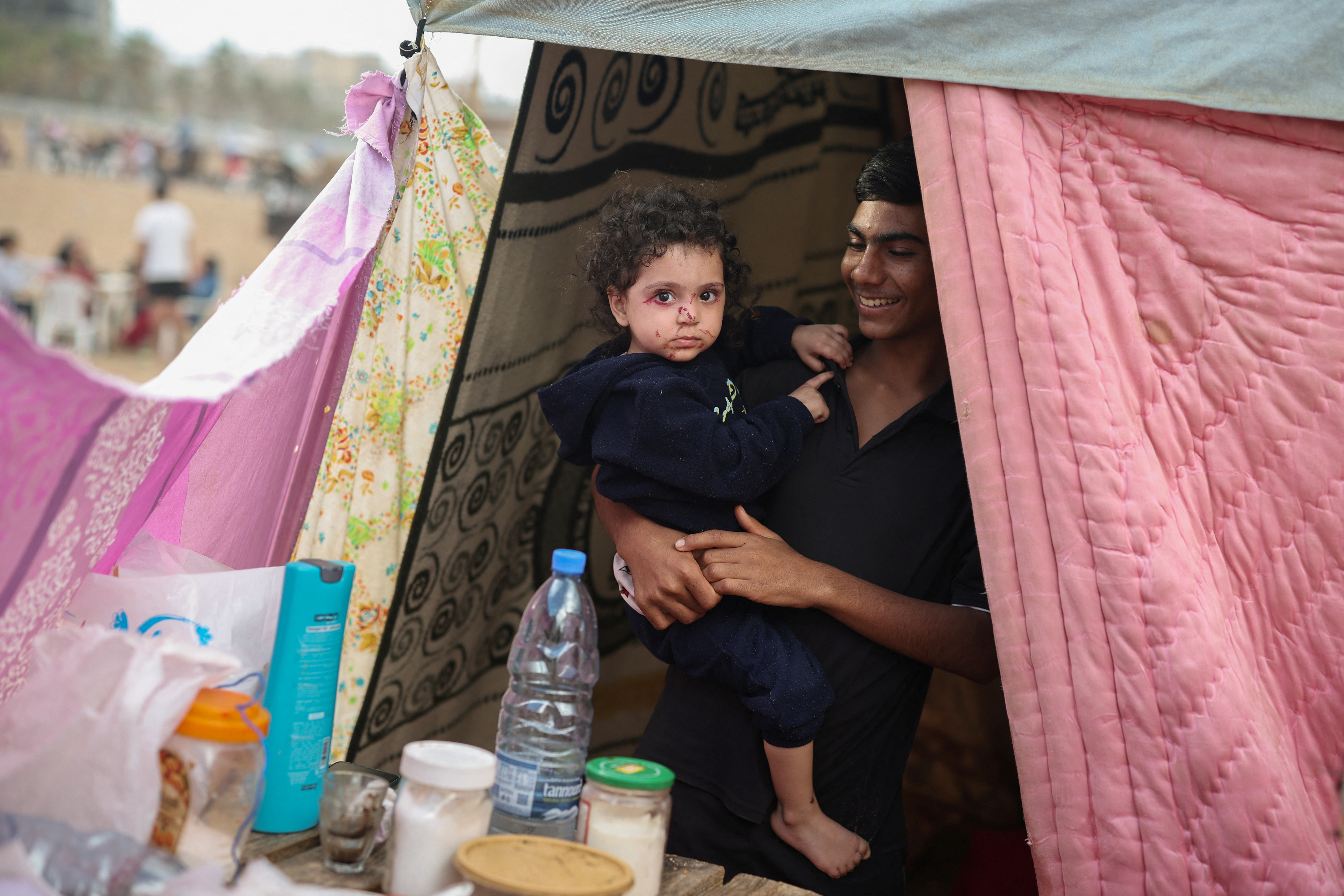 Makeshift encampment for displaced families at beach in Beirut