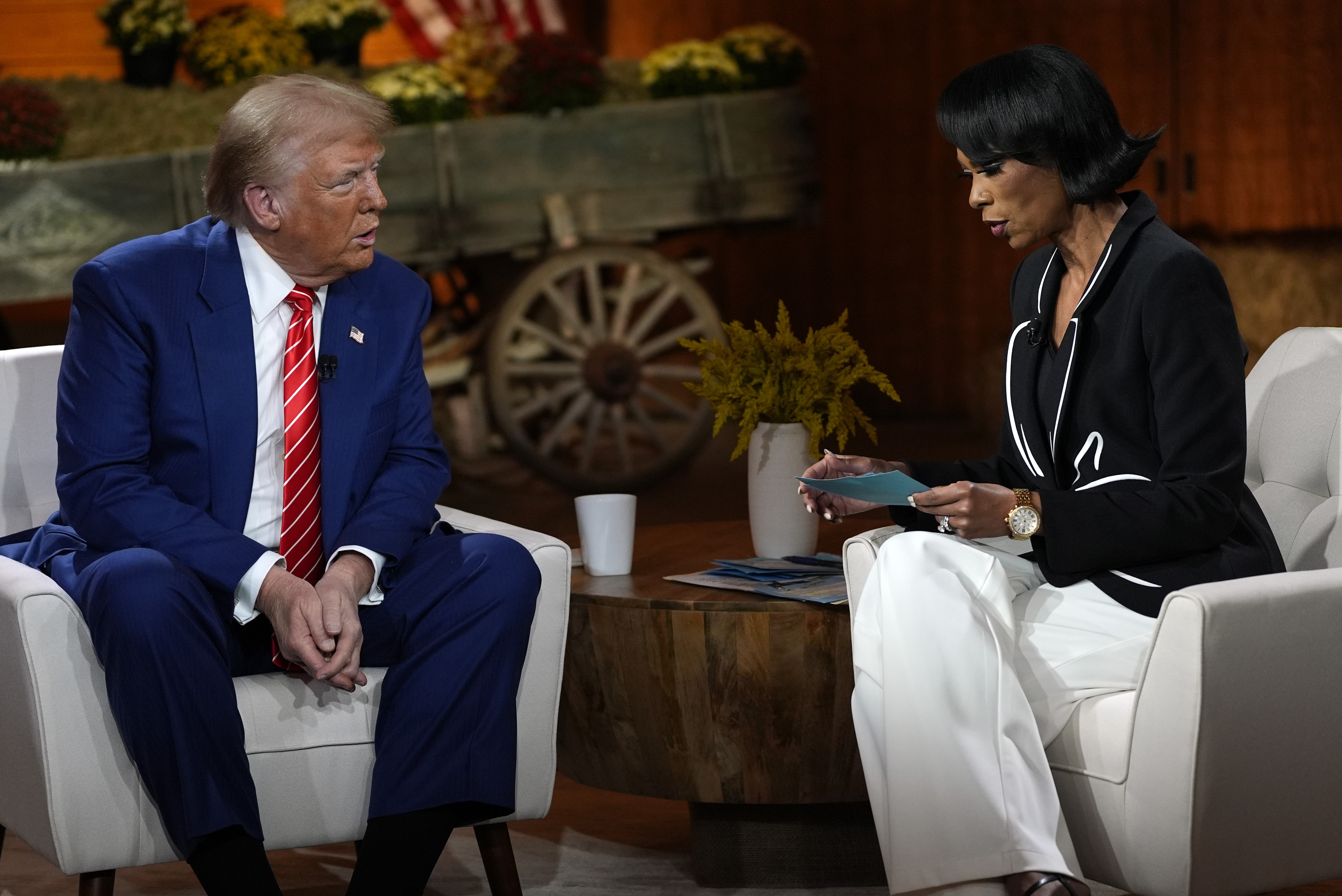 Donald Trump sits with Harris Faulkner at a Fox News studio