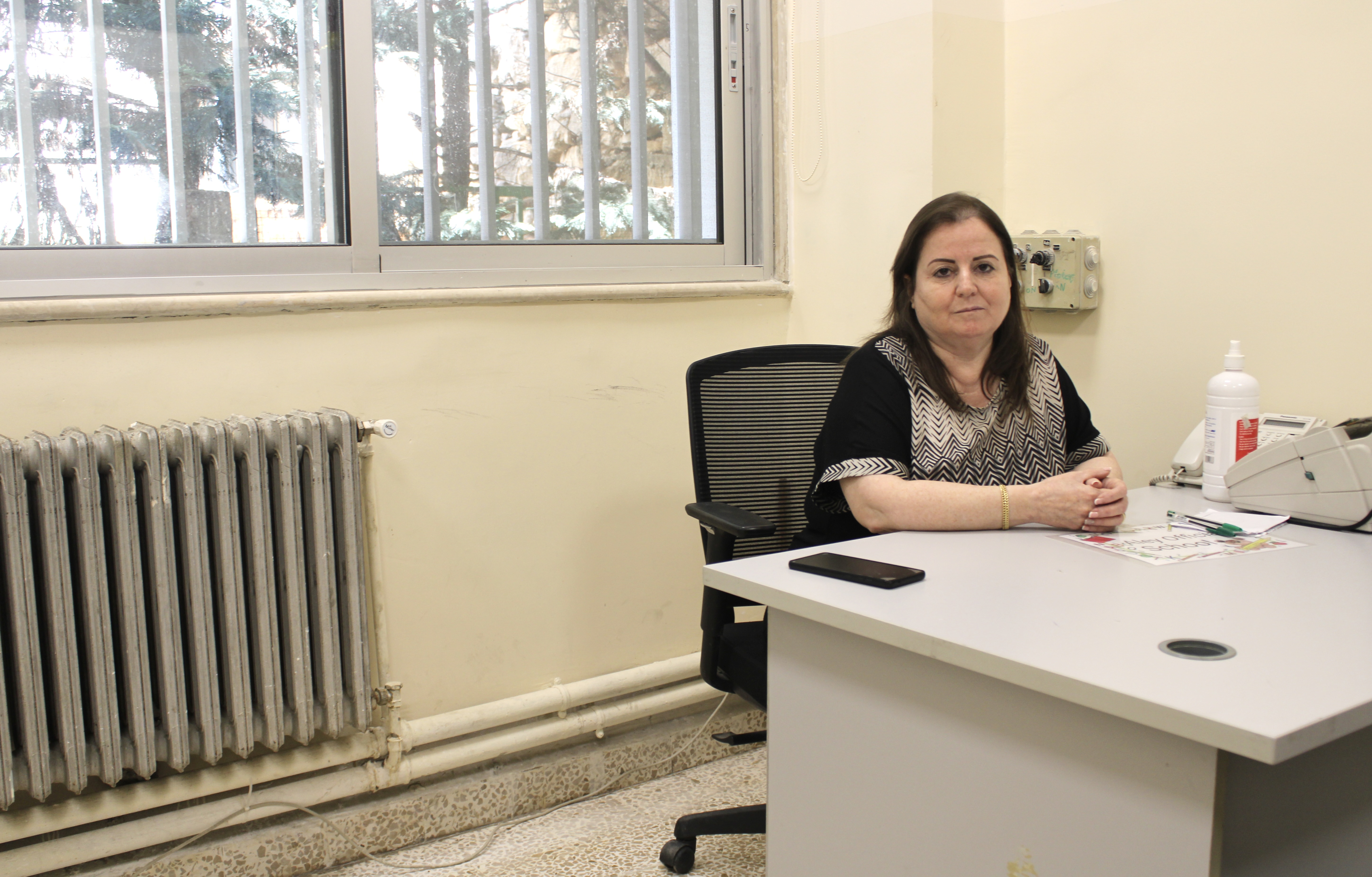 Hanan al-Lama, director of the Khalid Jumblatt Public School of Aley, in her office