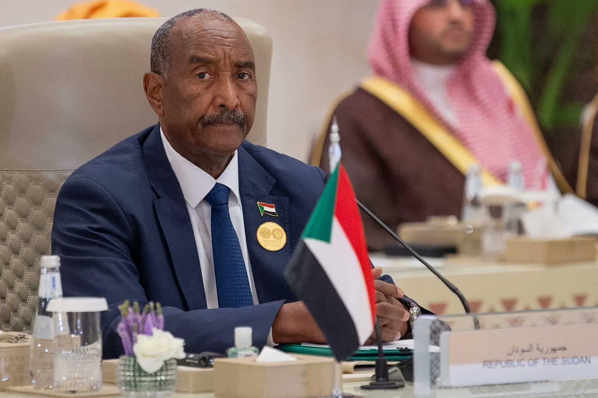 A handout picture provided by the Saudi Press Agency SPA shows Sudan's de facto leader, Abdel Fattah al-Burhan, attending the Organization of Islamic Cooperation (OIC) and the Arab League joint extraordinary leaders summit in Riyadh on November 11, 2024. (Photo by SPA / AFP) / RESTRICTED TO EDITORIAL USE - MANDATORY CREDIT "AFP PHOTO / HO / SAUDI PRESS AGENCY SPA" - NO MARKETING NO ADVERTISING CAMPAIGNS - DISTRIBUTED AS A SERVICE TO CLIENTS